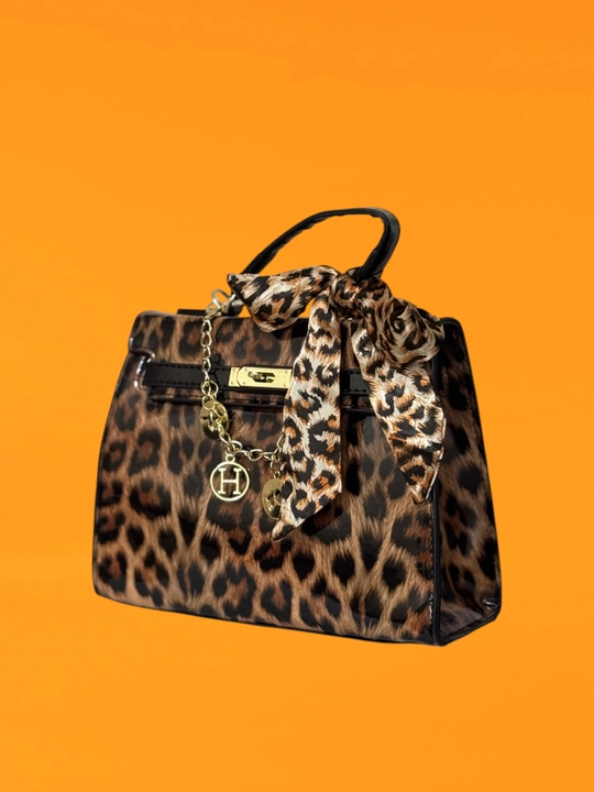 Ayollar uchun leopardli sumka