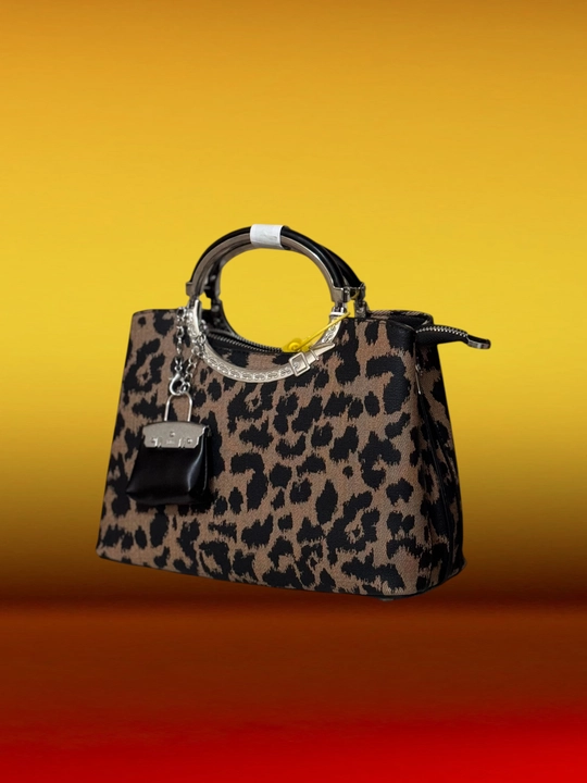 Ayollar uchun leopardli sumka