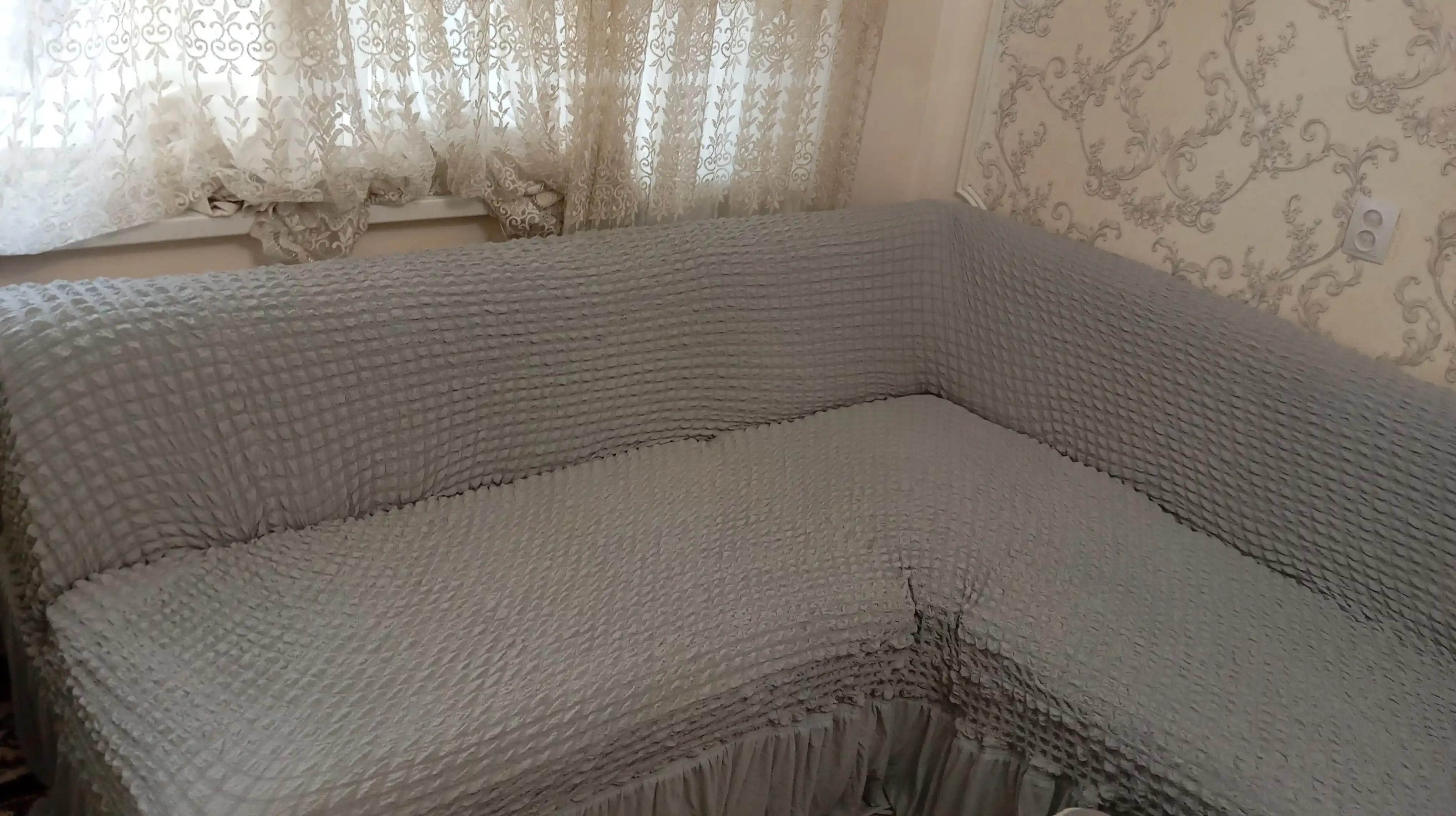 Burchakli divan uchun universal qoplama