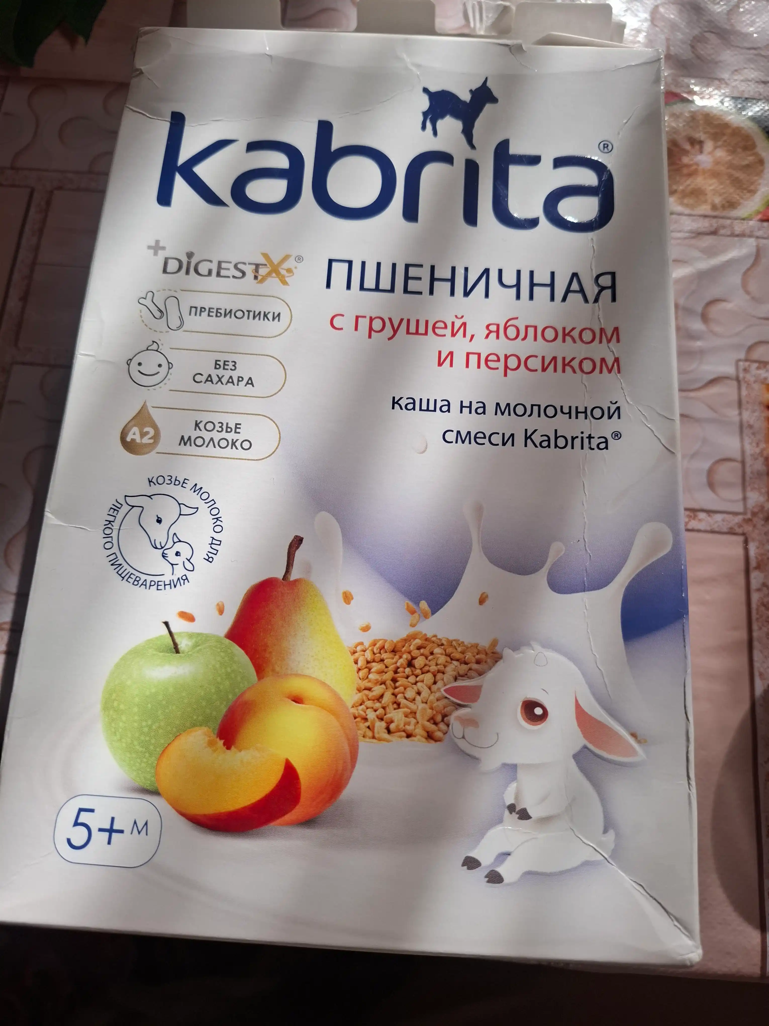 Bug'doy kashasi  "Kabrita", sut aralashmasida nok, olma va shaftoli qo'shilgan, 5+, 180 gr