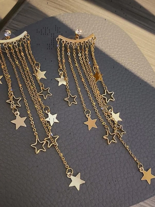 Turli shakl va ranglardagi katta o'lchamli sirg‘alar