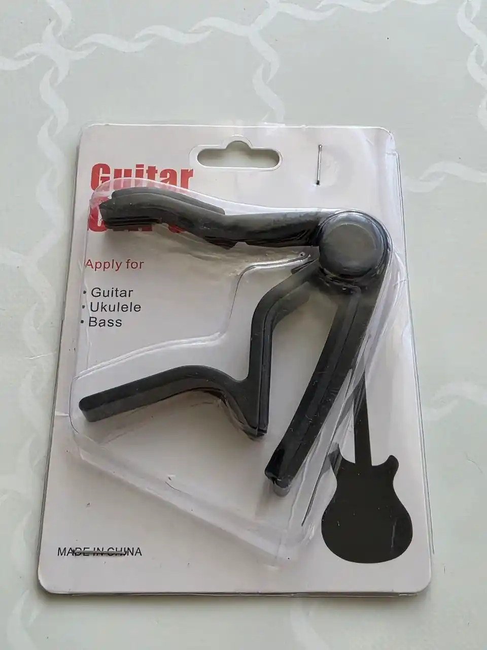 Akustik, elektr gitara va ukulele uchun universal kapodastr, torlar qisqichi