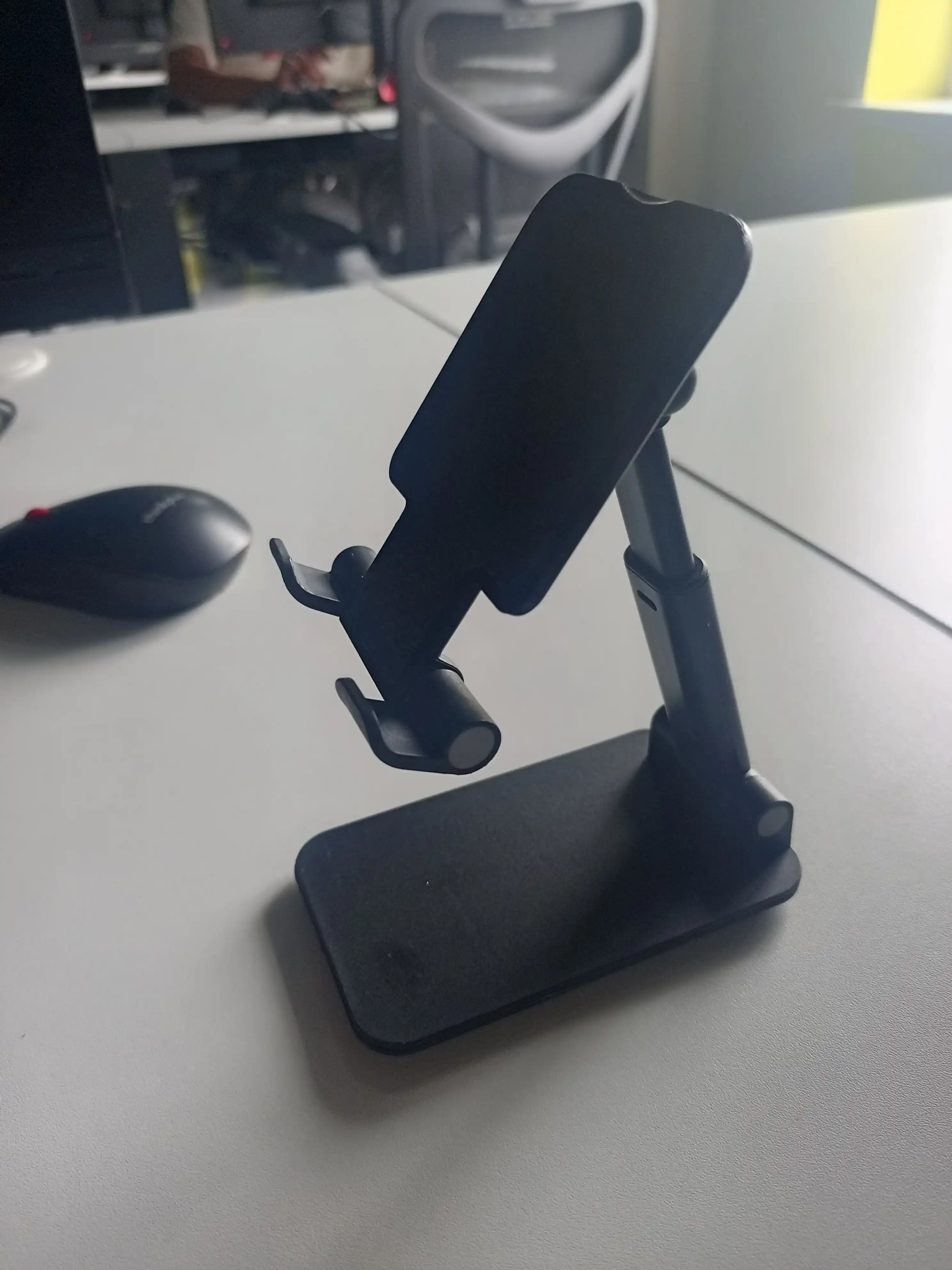 Telefon va planshet uchun sozlanadigan, buklanadigan taglik-ushlagich