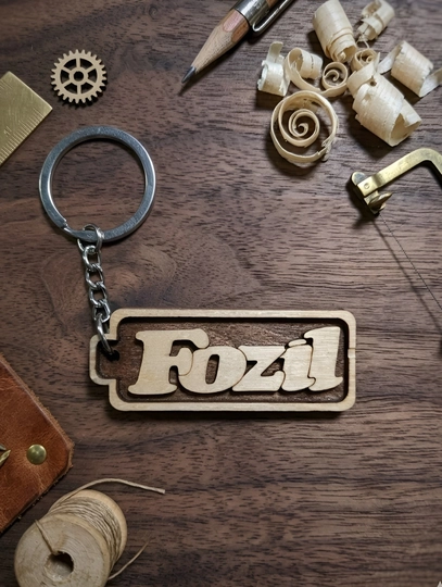 Fozil  именной брелок — УЗБРЕЛО-ПКFOZIL-БЕЖМЕЛ