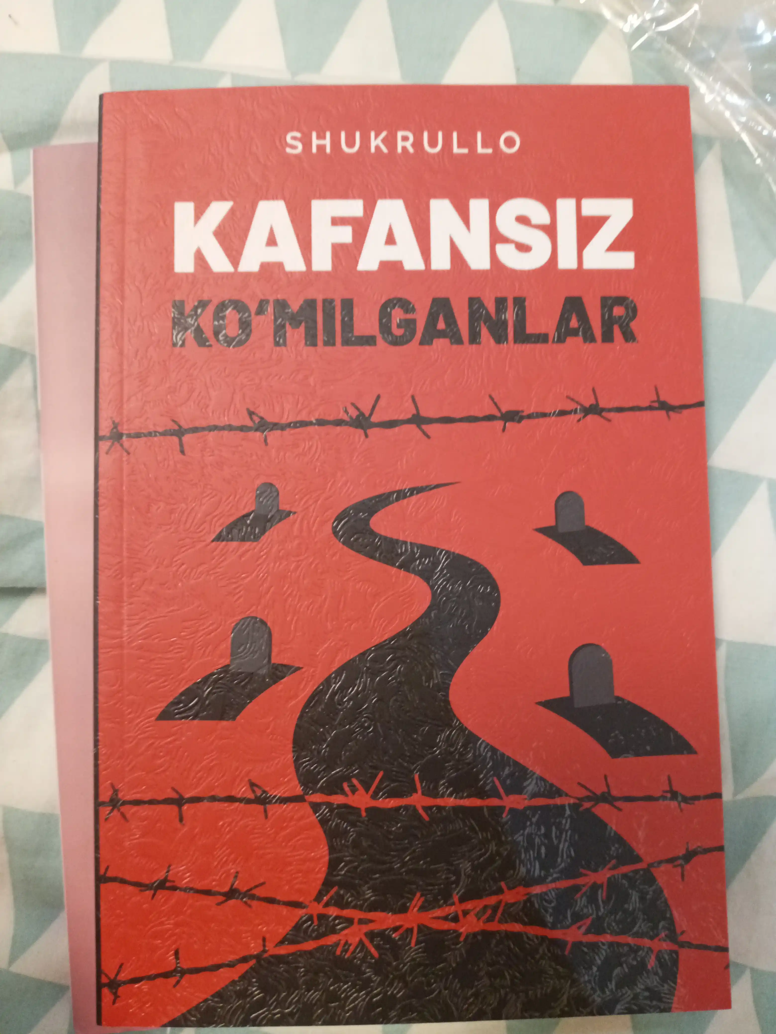 Кафансиз ко'милганлар, Шукрулло