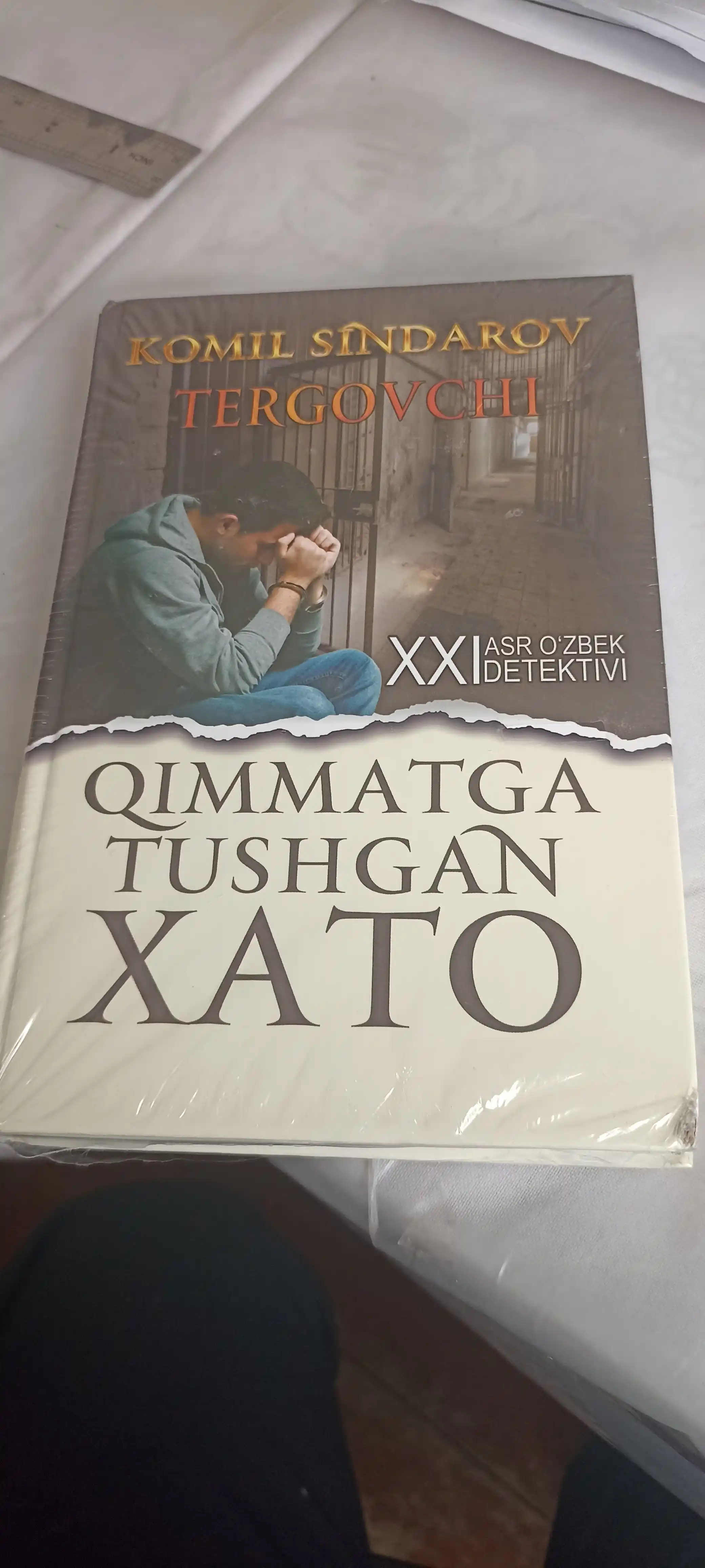 Қимматга тушган хато (Комил Синдаров) детективная повесть на латыни