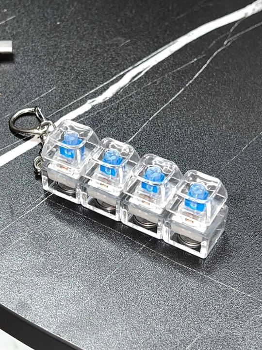 Yoritgichli antistress switch klaviatura-brelok — stressni kamaytirish uchun gadjet