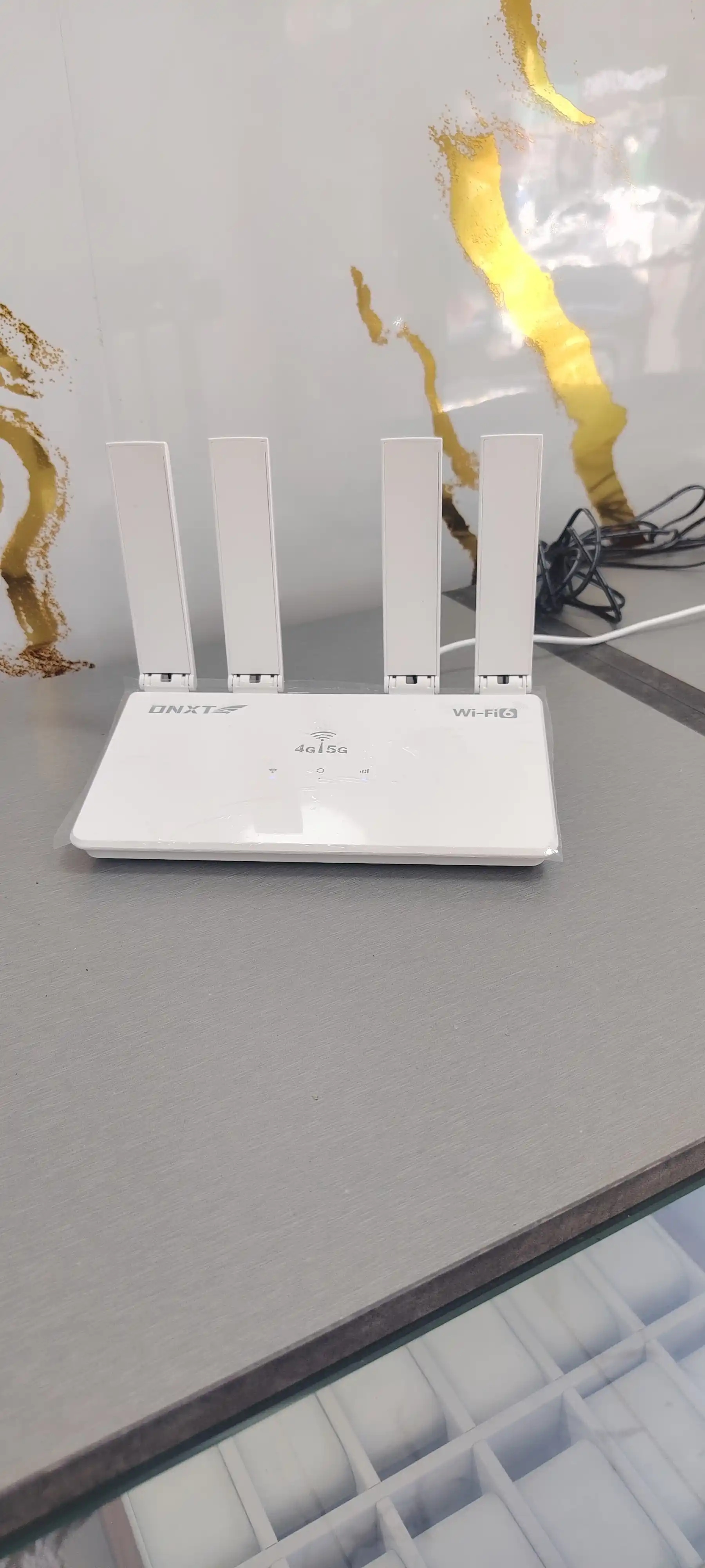 4G+ WIFI6 ONXT CPE-906-E SIM-karta orqali Ishlaydigan router