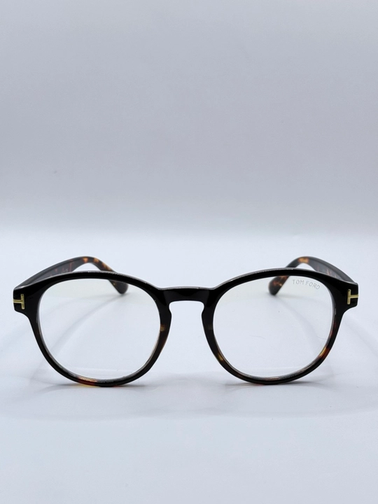 Tom Ford xameleon ko'zoynaklar, kompyuter, polaroid