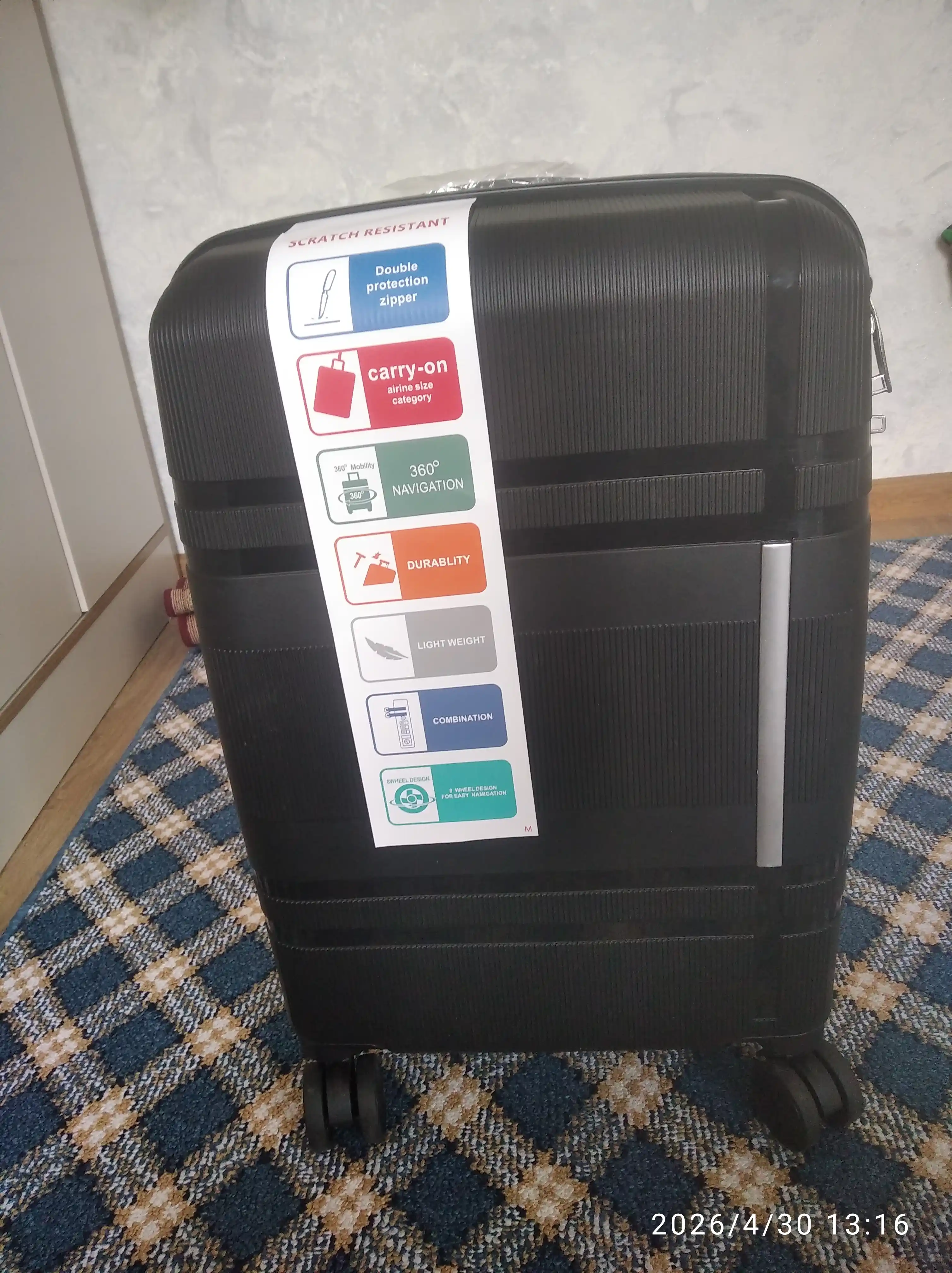 Sayohat chamadoni, 4 g'ildirakli, PP materialdan, kodli qulf bilan
