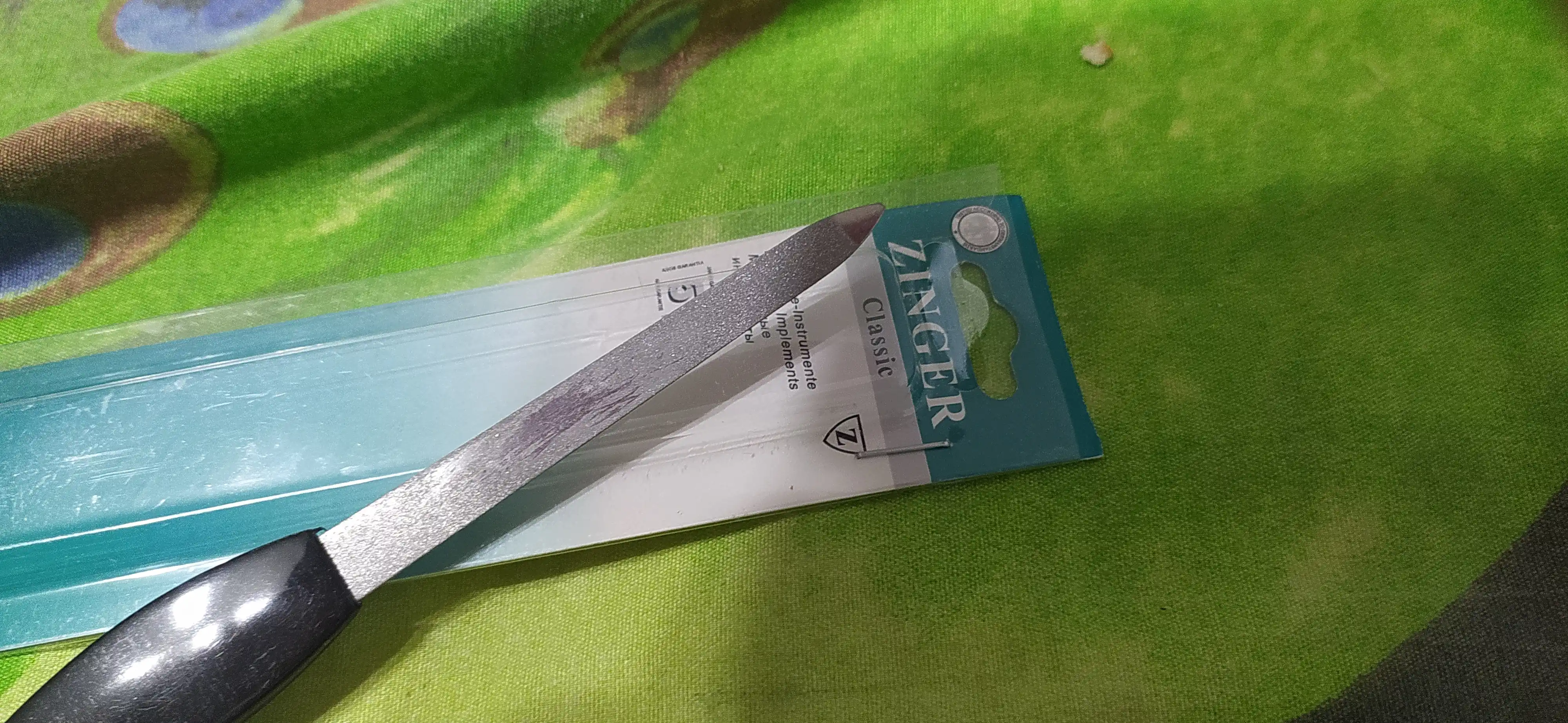 Tirnoq uchun pilka Zinger, pichoq bilan kutikulalar uchun