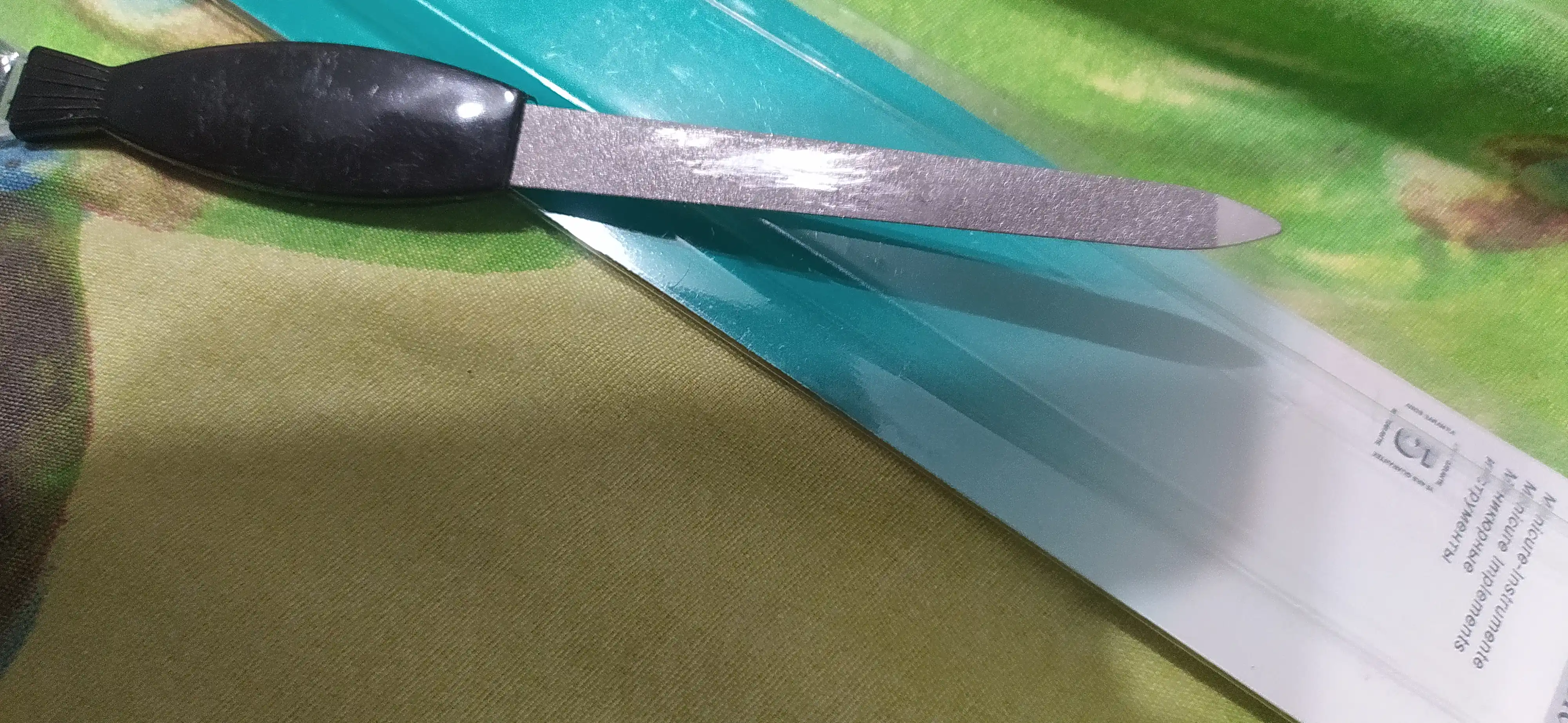 Tirnoq uchun pilka Zinger, pichoq bilan kutikulalar uchun