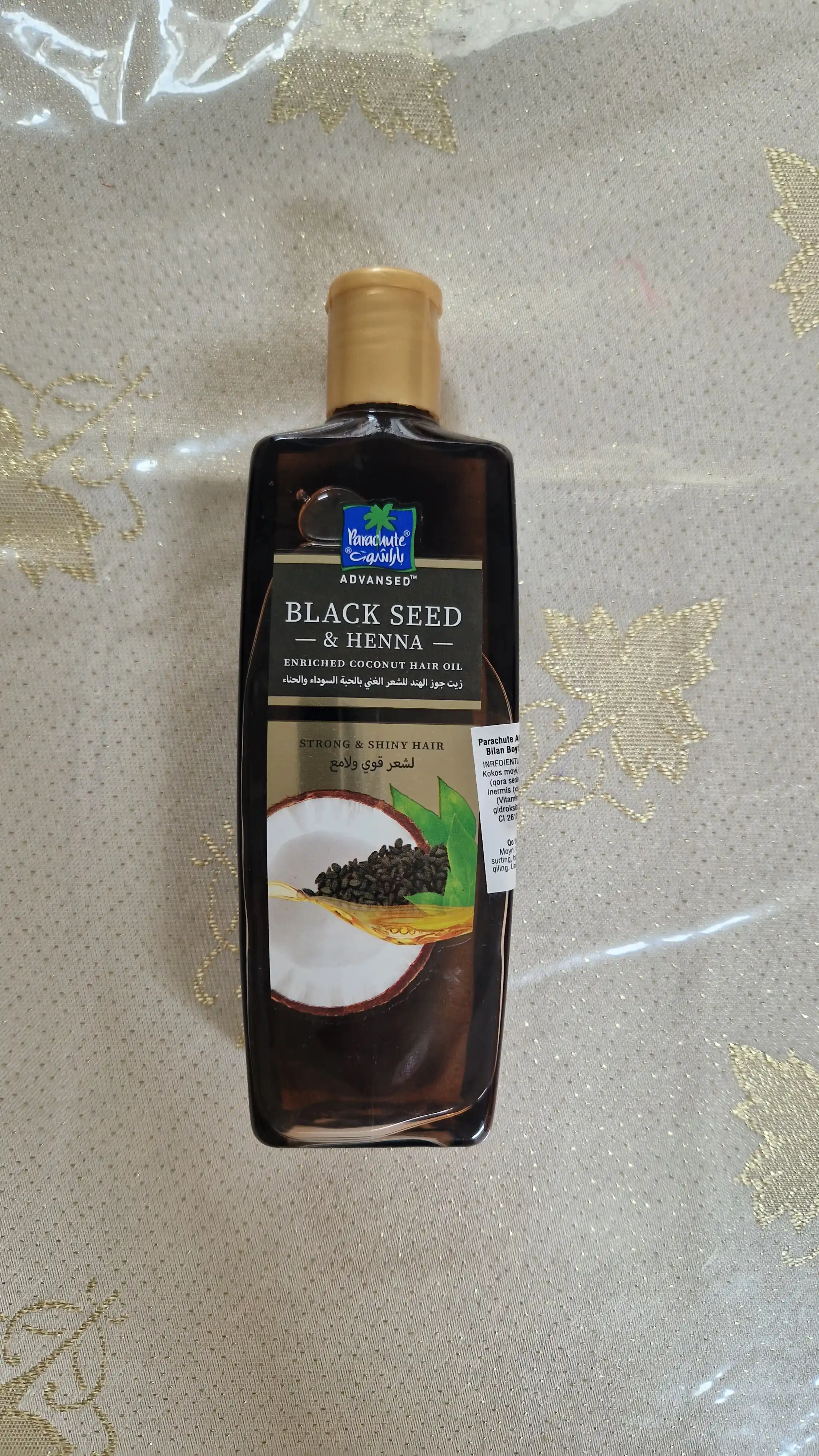 Кокосовое масло с черным тмином и хной PARACHUTE BLACKSEED & HENNA COCONUT HAIR OIL