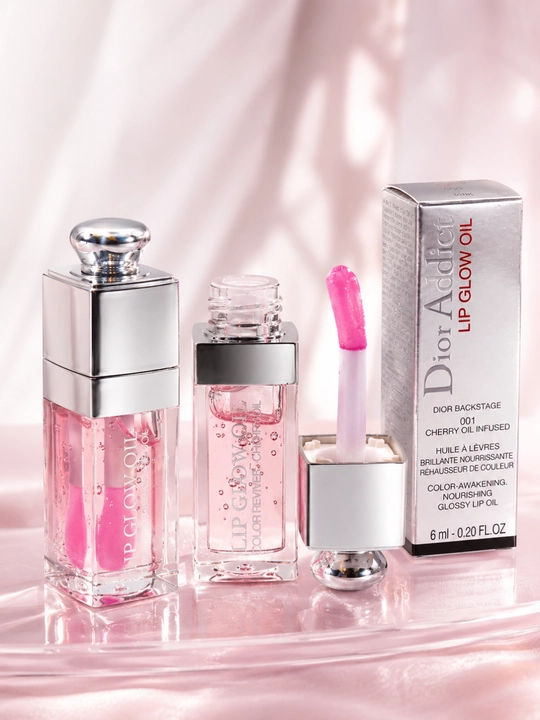 Dior Lip Glow Oil 001 Pink lab uchun yaltiroq namlantiruvchi moyi, nafis pushti yaltiroq ta’sirga ega