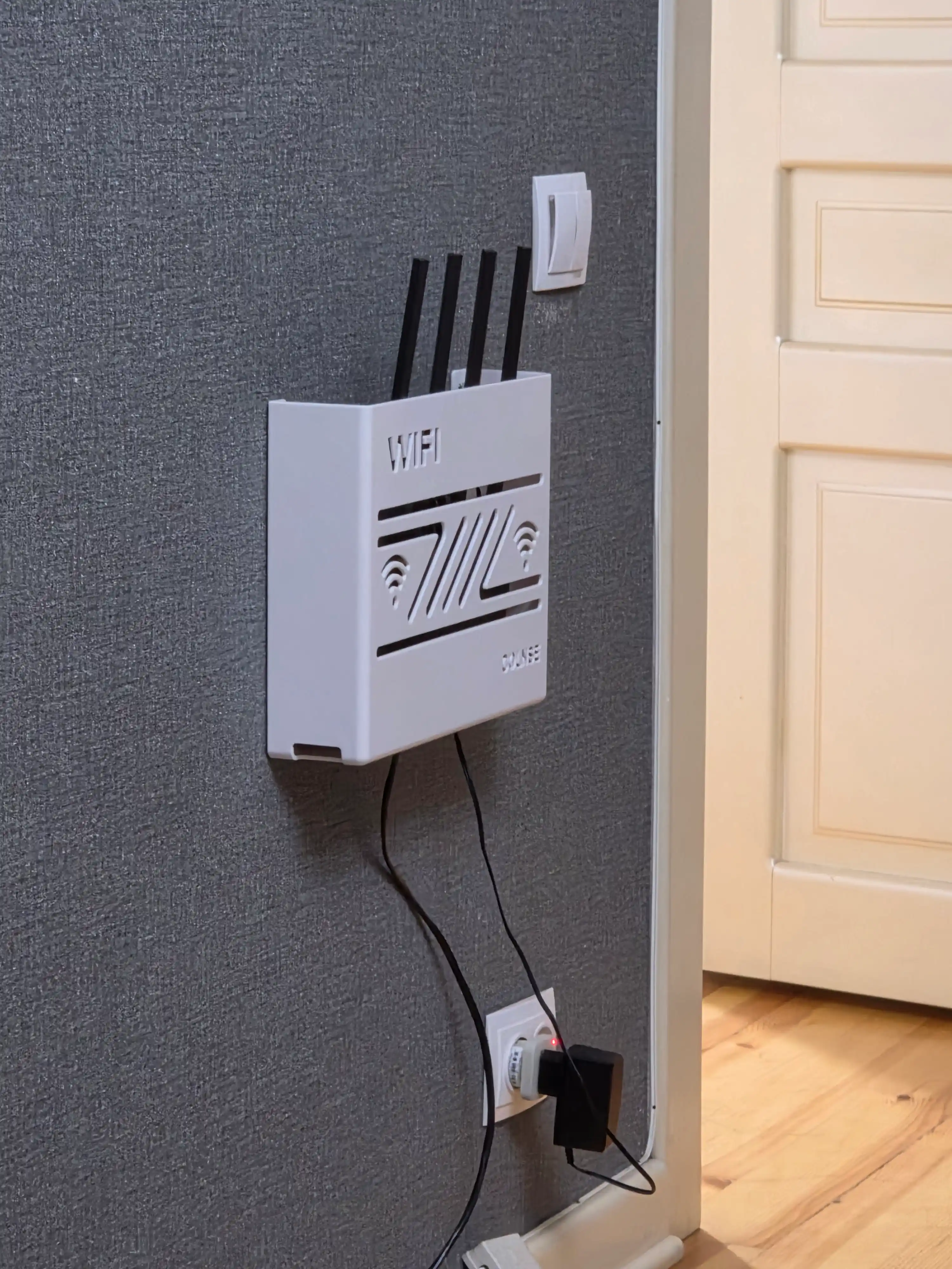 Wi-Fi router uchun devorga ornatiladigan organayzer