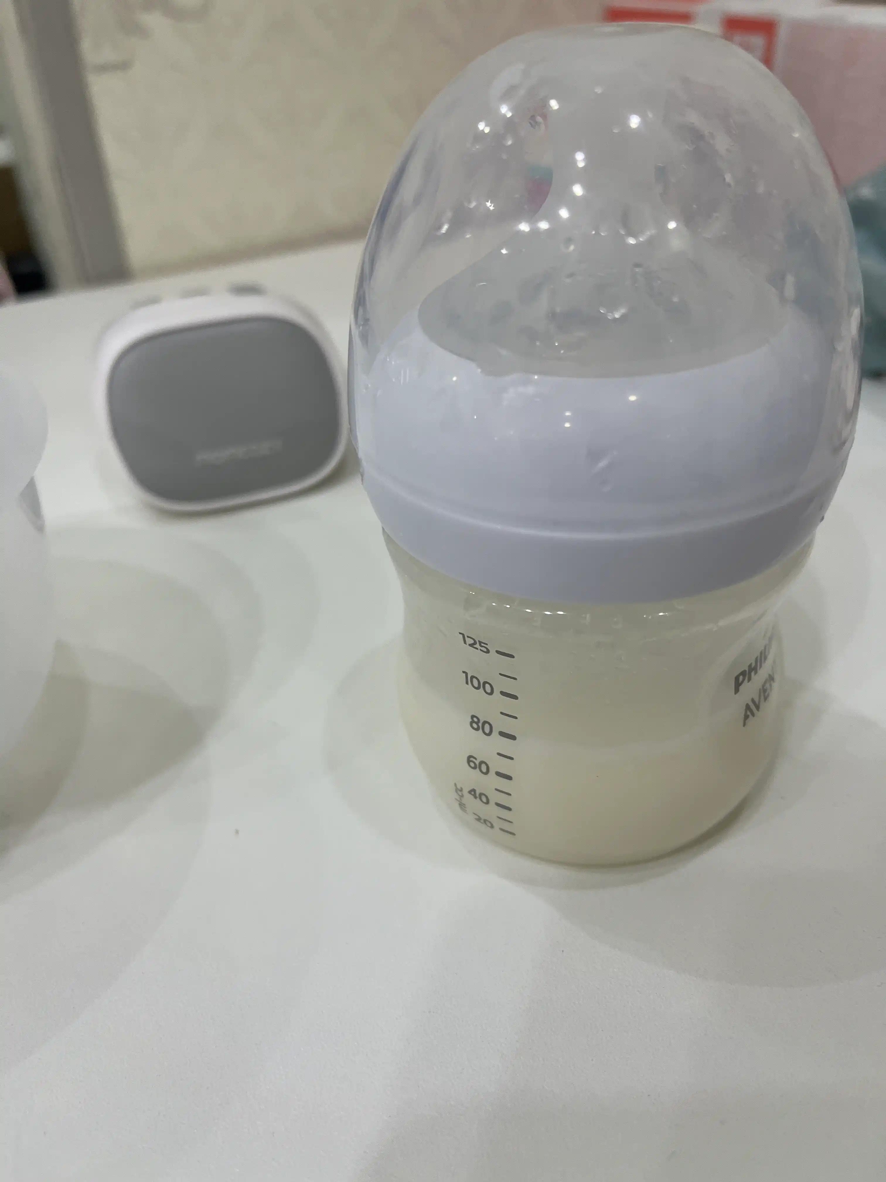 Momcozy S9 Pro — ko‘krakka kiyiladigan elektr sut sog‘ish apparati, 9 daraja, pushti