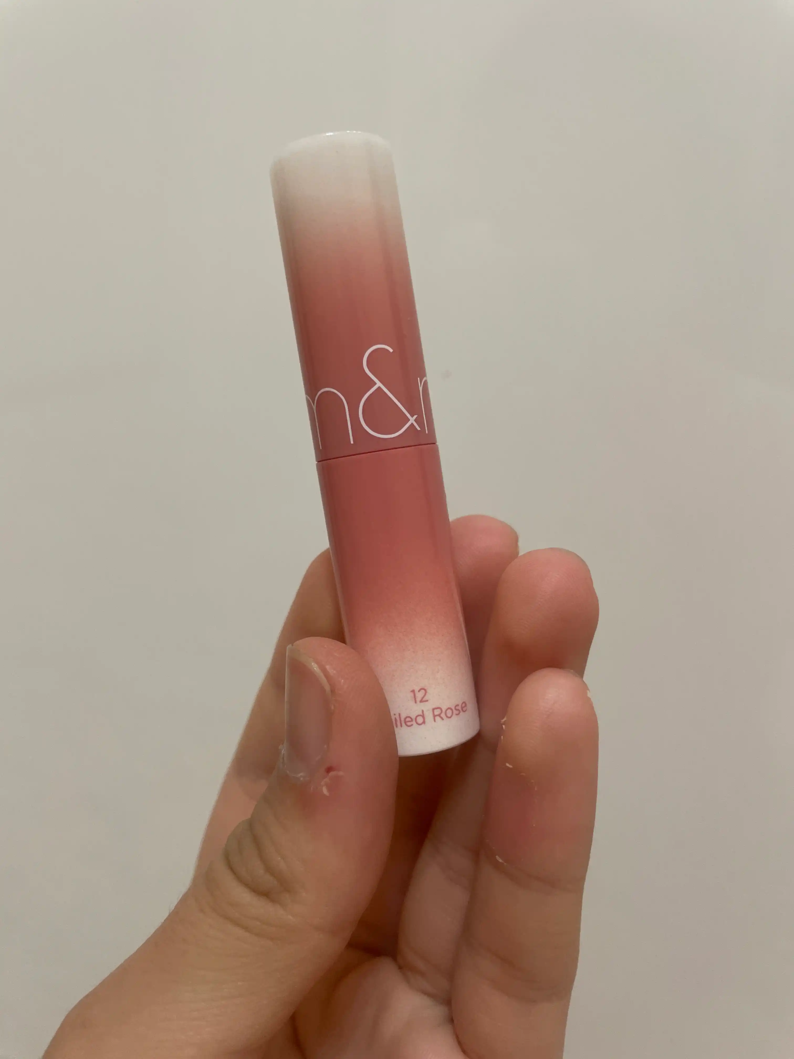 Тающий оттеночный бальзам для губ Rom&nd Glasting Melting Balm