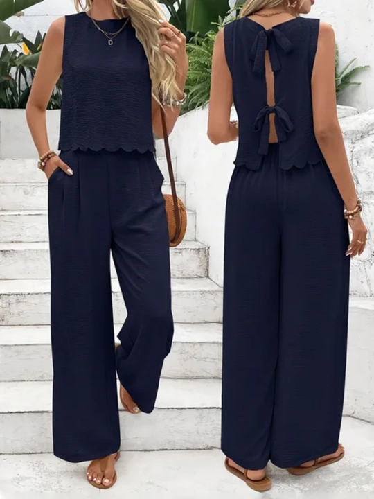 Ayollar uchun yozgi kostyum – keng shim va yengsiz bluzka, 2 qismli casual to'plam - 