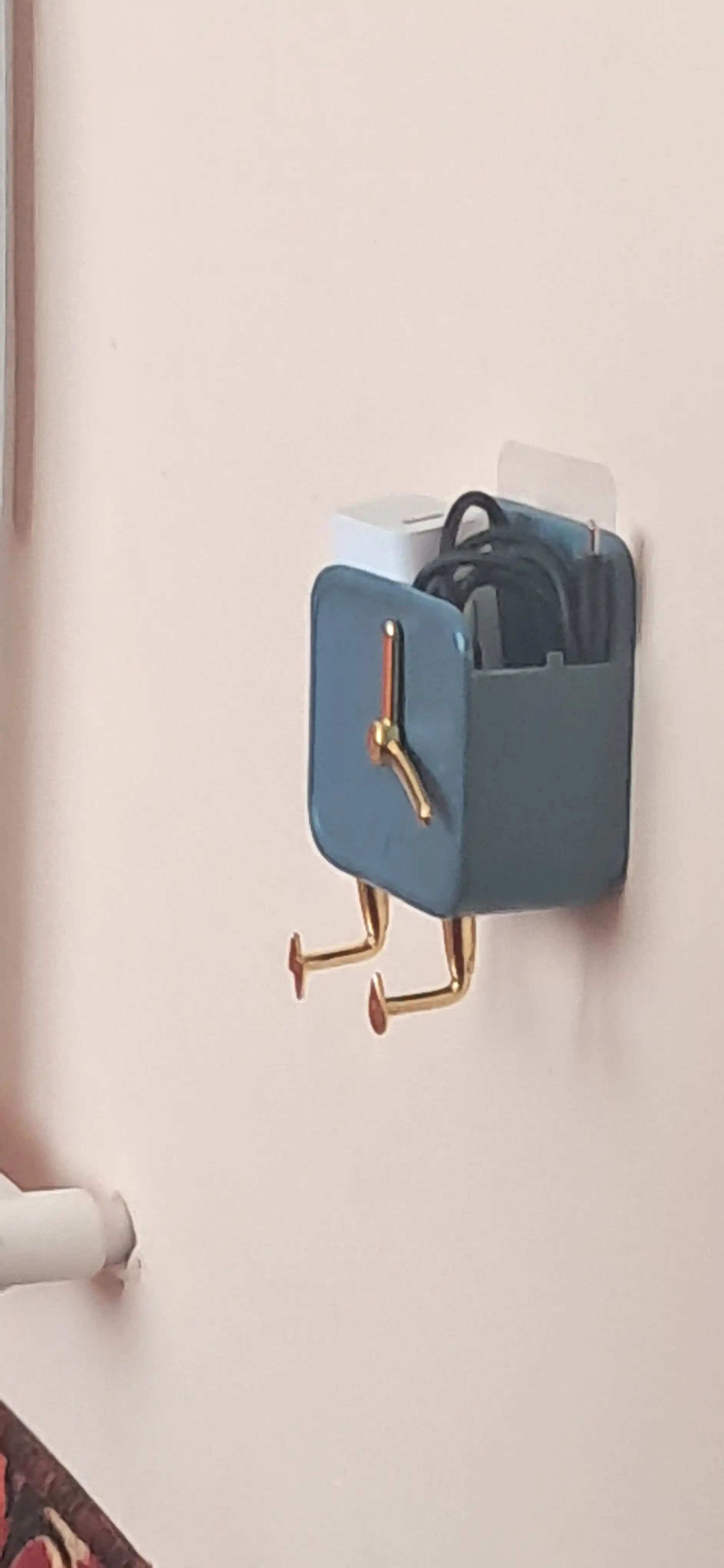 Telefon va pult uchun devor ushlagichi