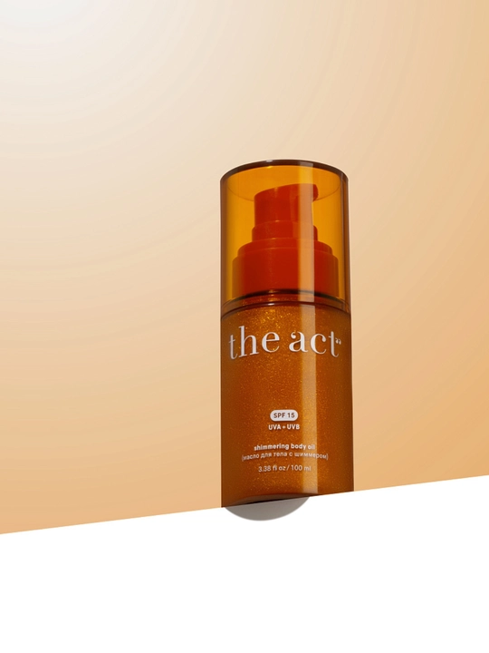 The Act Shimmering Body Oil SPF 15 - Масло для загара с шиммером и защитой от солнца - 