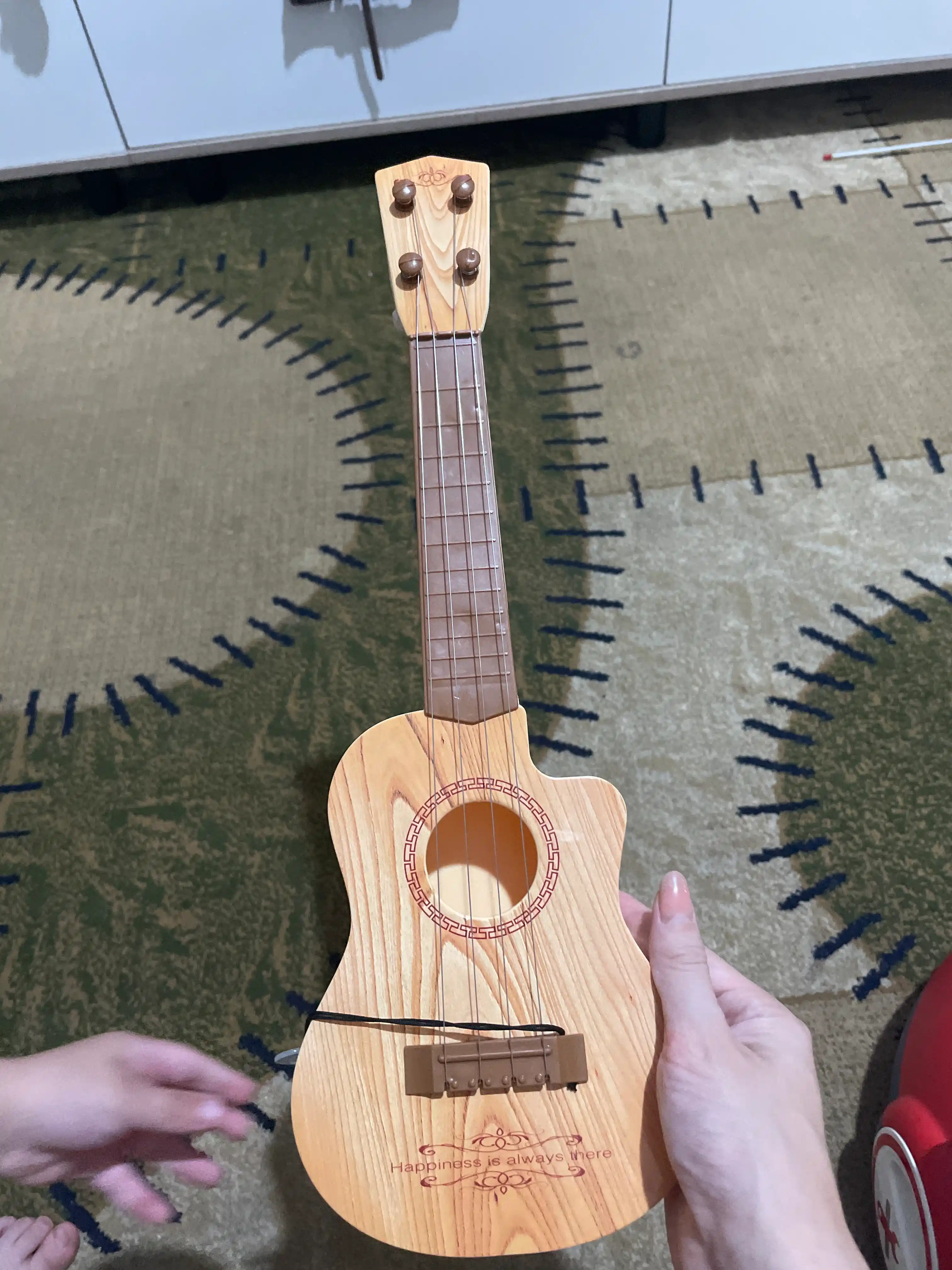 Bolalar uchun ukulele gitara