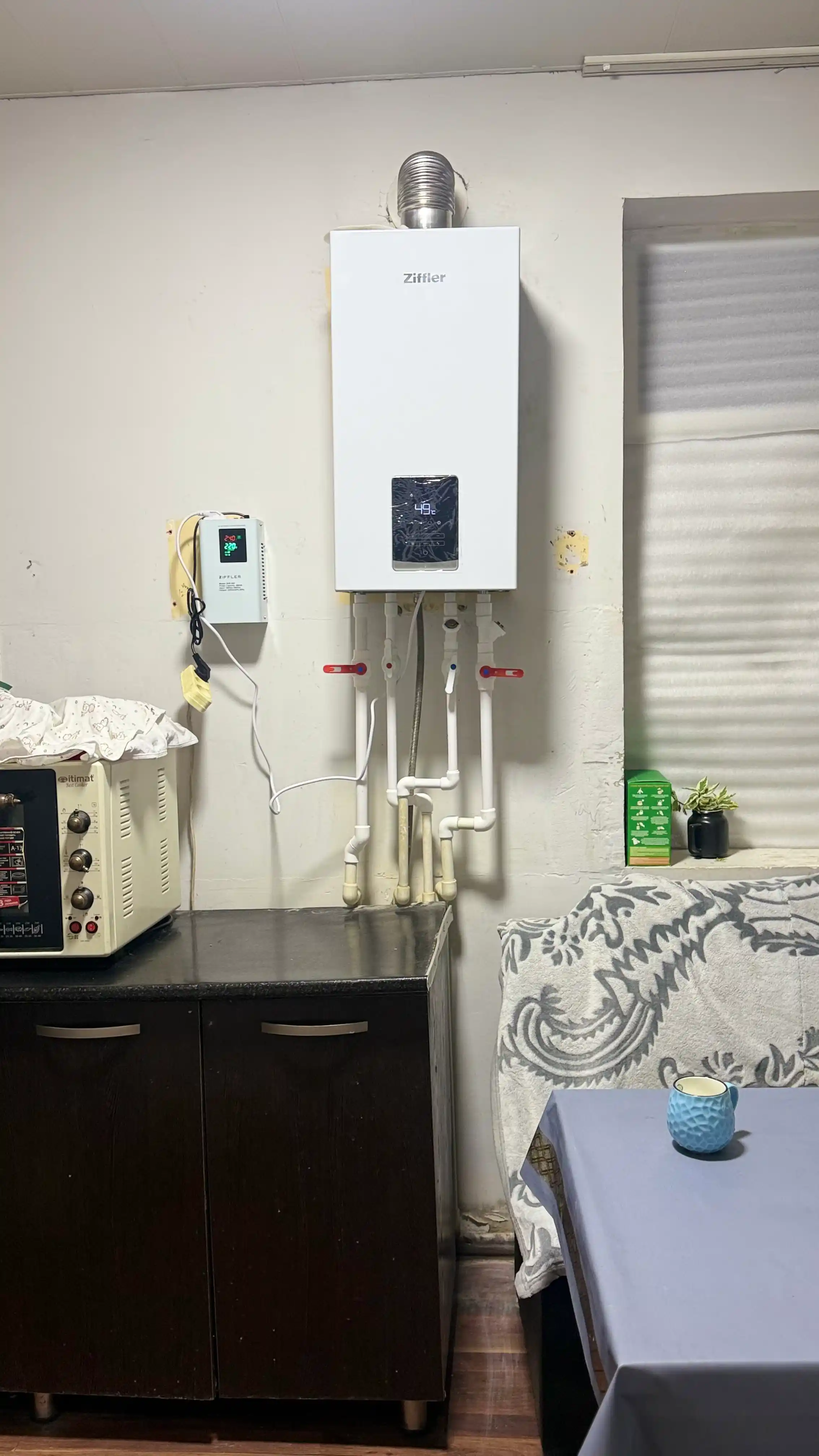 Ziffler ikki konturli gaz qozoni 16–40 kVt, devorga o'rnatiladigan koteli, 2 yil kafolat