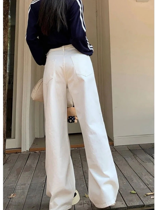 Ayollar uchun baland belli mom jeans – turli rangdagi denim shimlar, jinsi shimlar