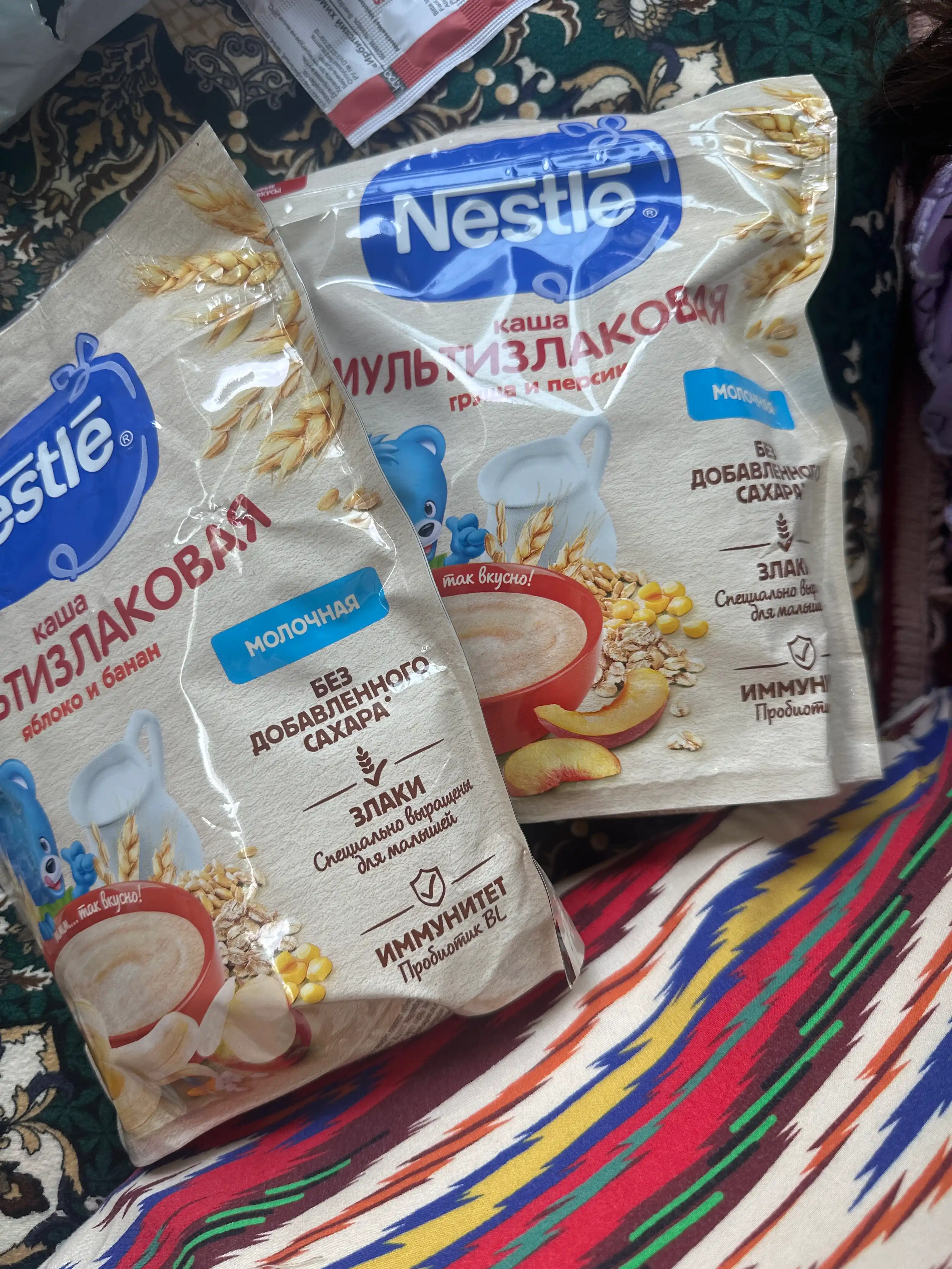 NESTLE® sutli ko‘pzraxli bo‘tqa, nok va shaftoli bilan, 6 oylikdan boshlab, 200 g