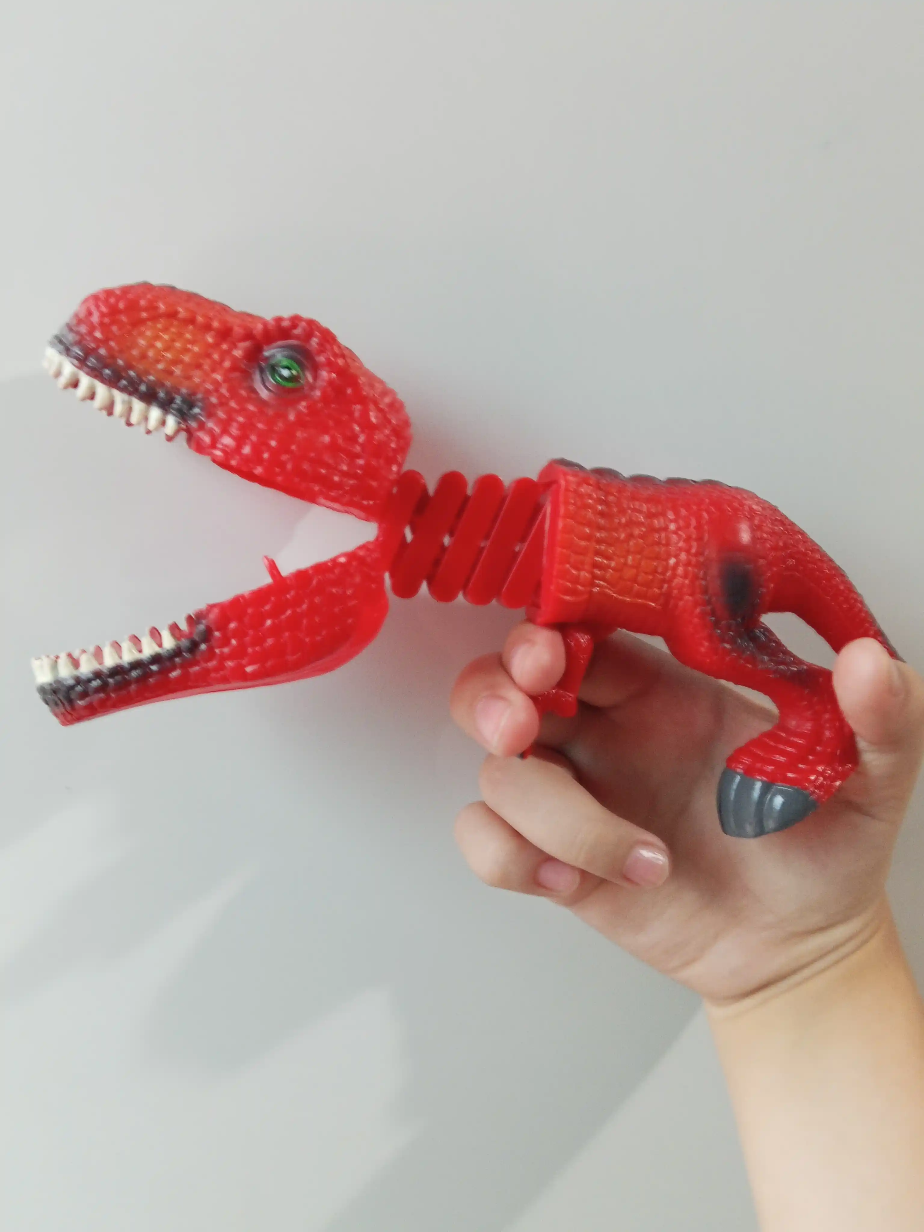 Dinozavr chaqish o'yinchog'i, motorikasini va hissiyotlarini rivojlantiruvchi, 3+ yosh