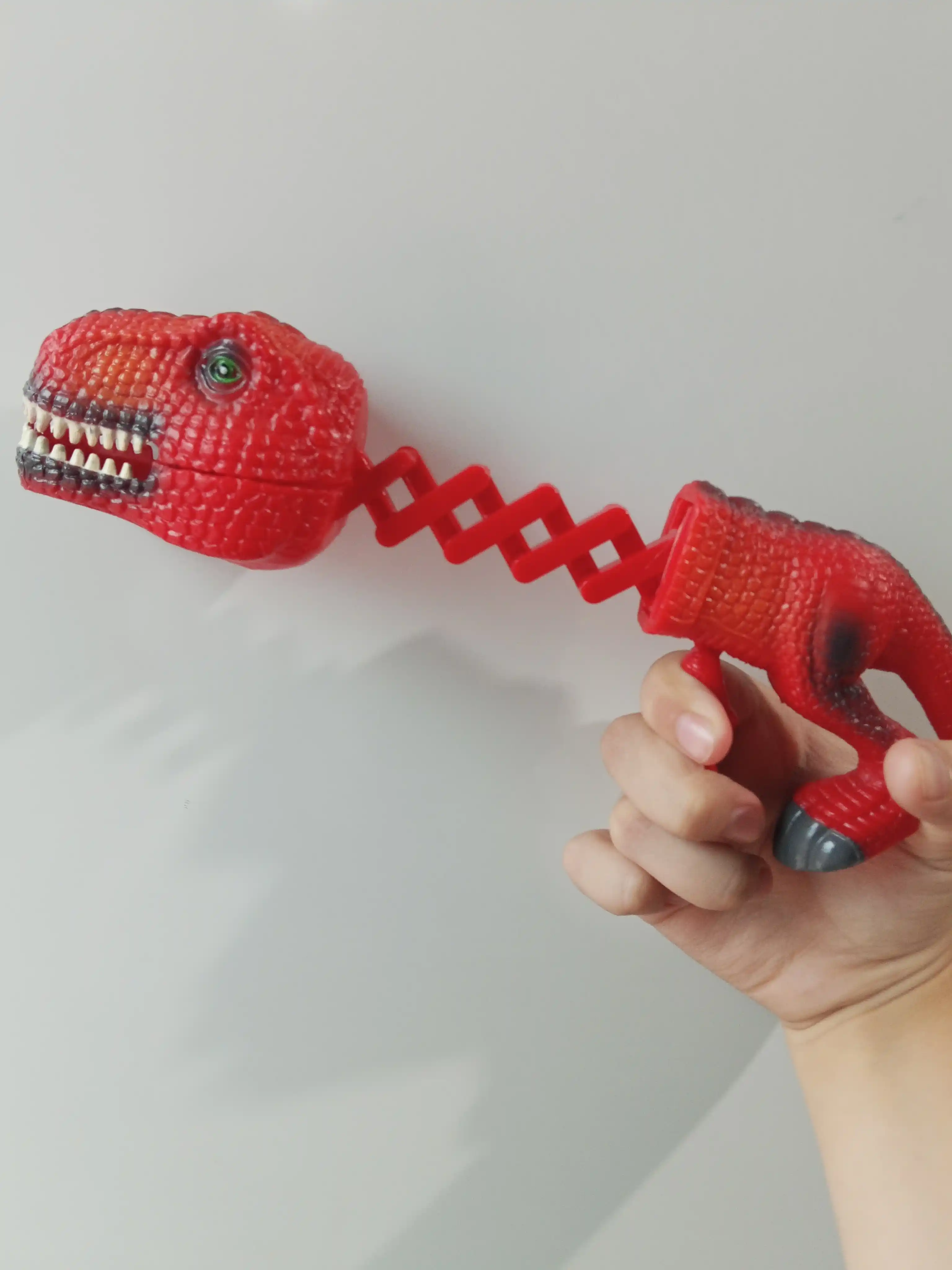 Dinozavr chaqish o'yinchog'i, motorikasini va hissiyotlarini rivojlantiruvchi, 3+ yosh