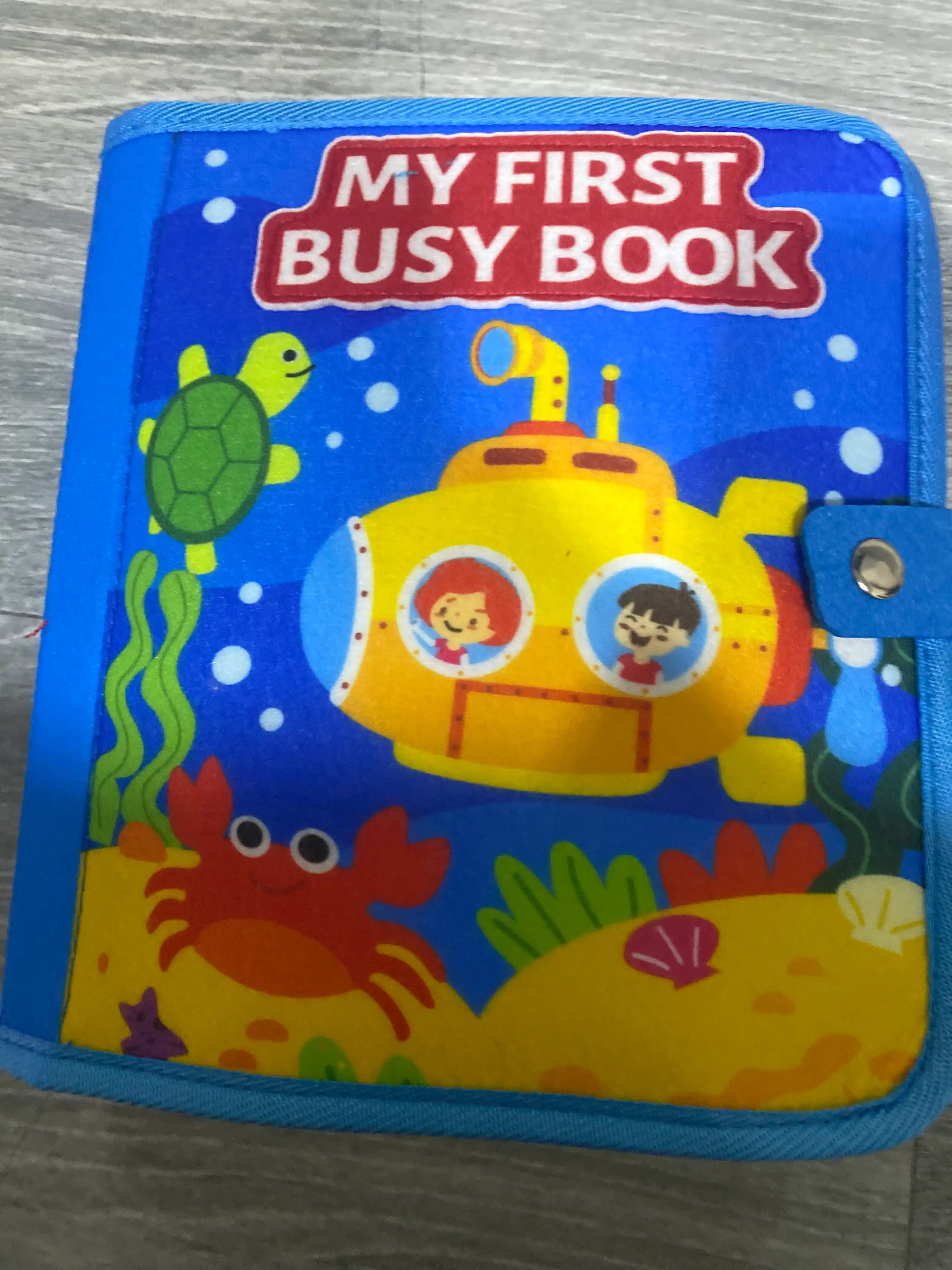 1 yoshgacha bo‘lgan bolalar uchun rivojlantiruvchi o‘yinchoq bizibord kitobchasi