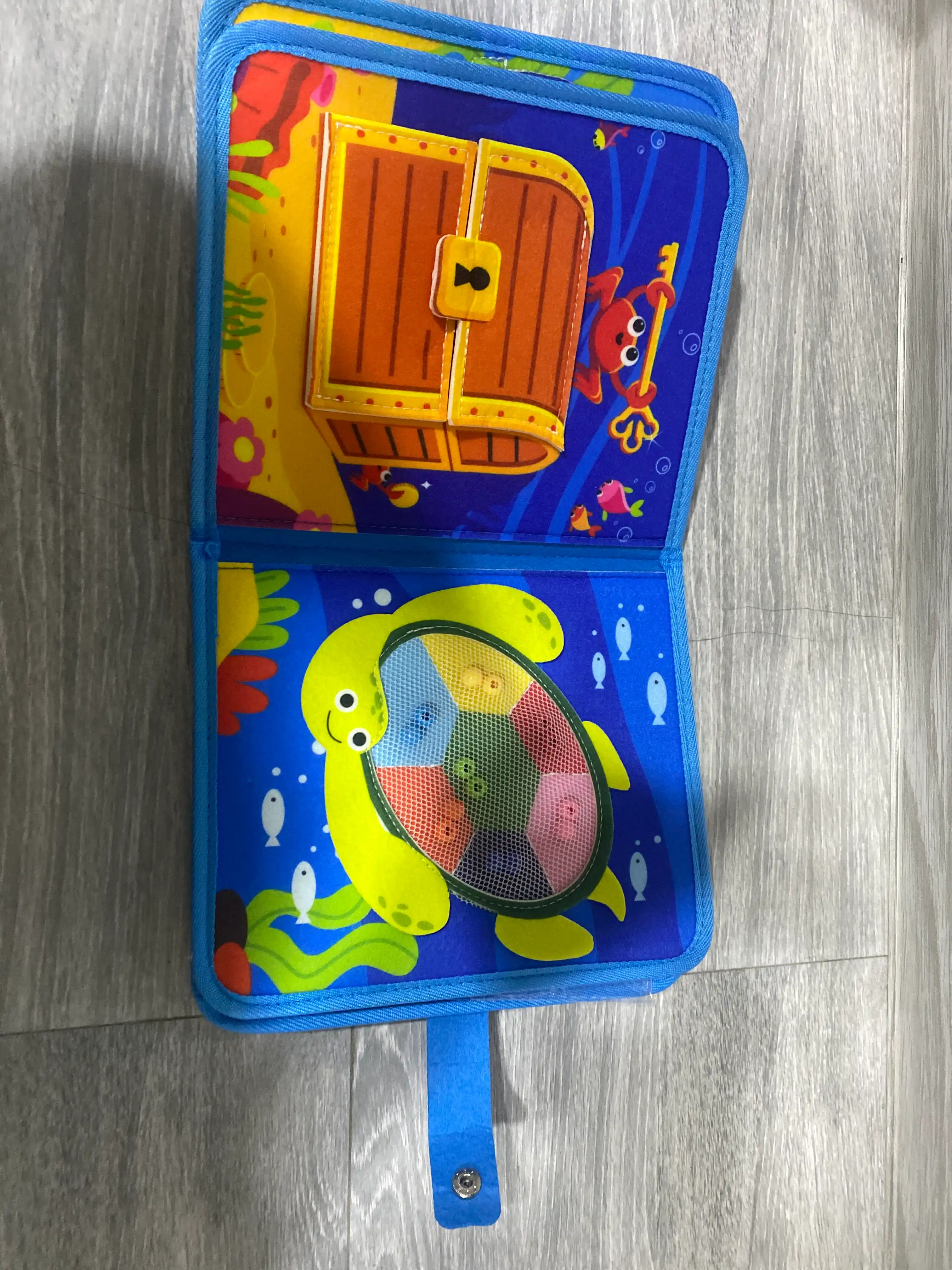 1 yoshgacha bo‘lgan bolalar uchun rivojlantiruvchi o‘yinchoq bizibord kitobchasi