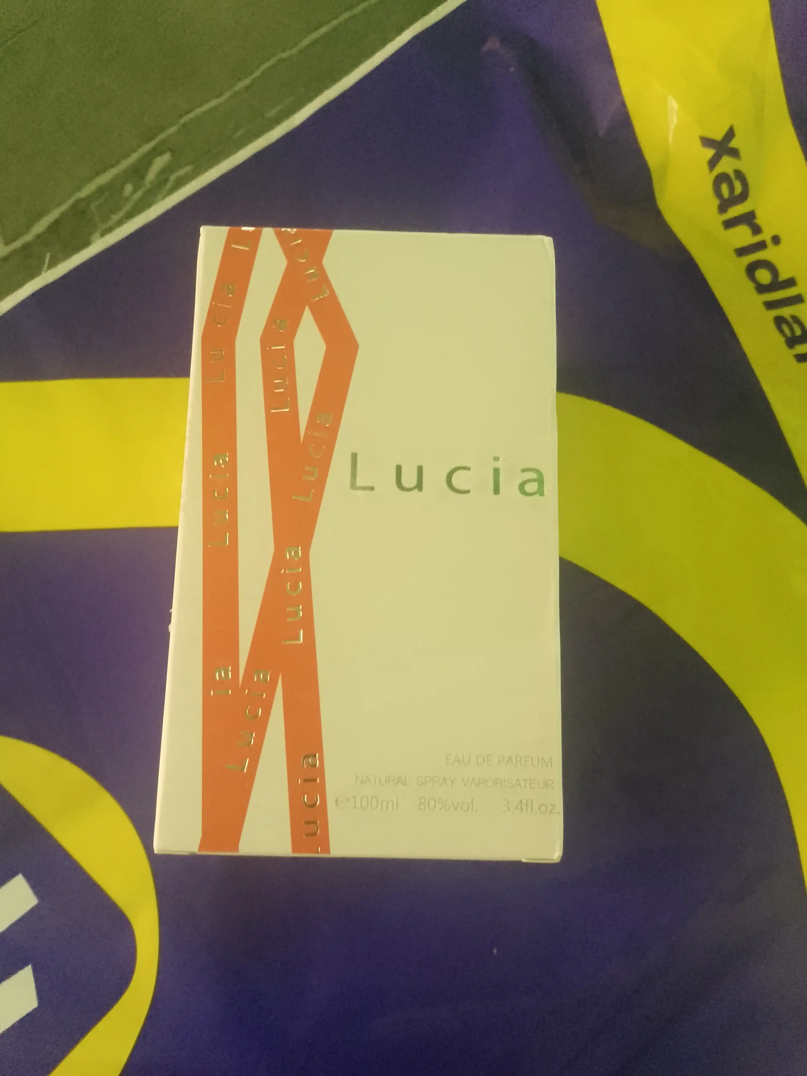 Parfyumlangan suv ayollar uchun Lucia, 100 ml