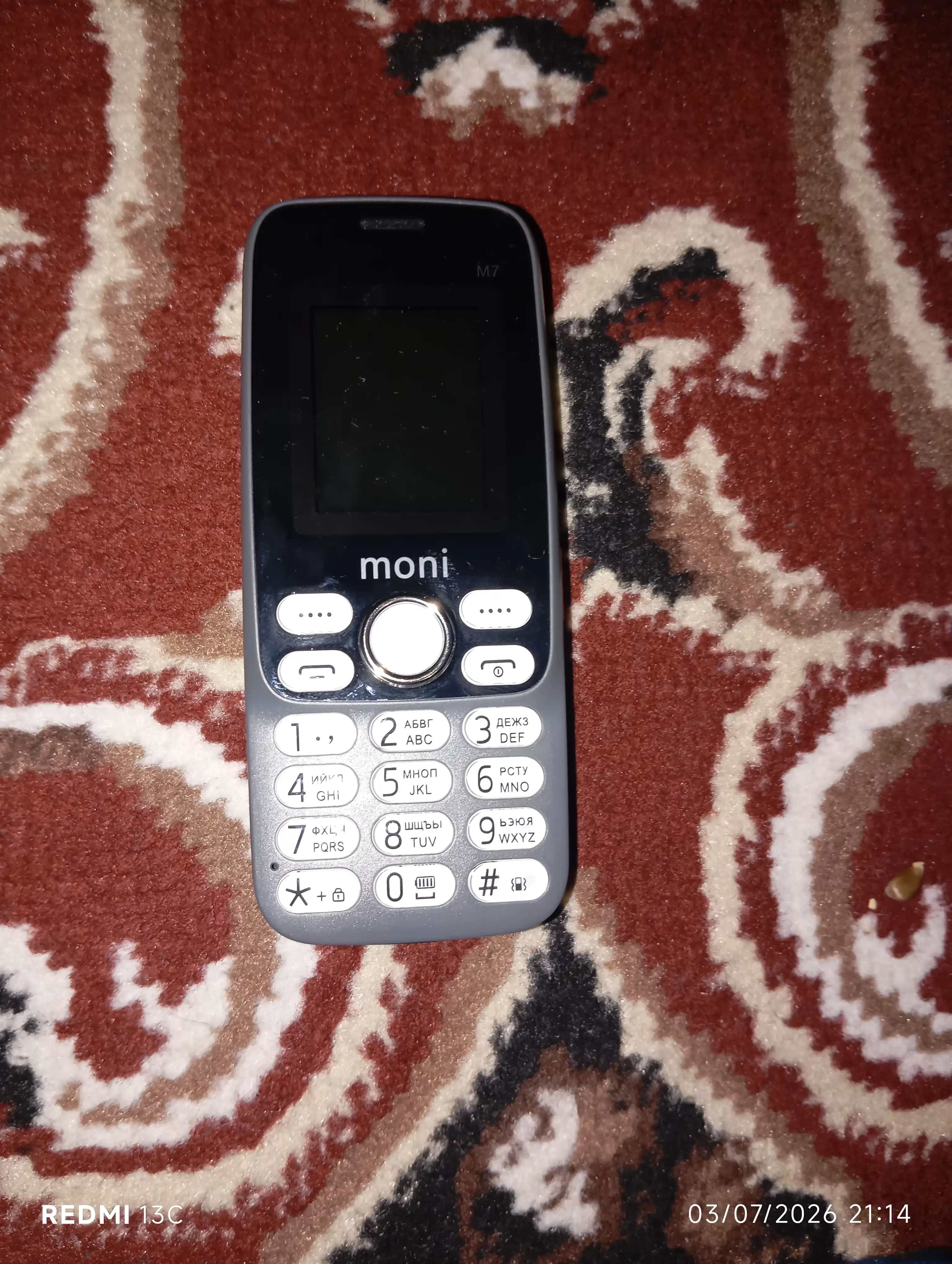 Moni M7 tugmachali mobil telefoni 2 SIM-karta  fonar