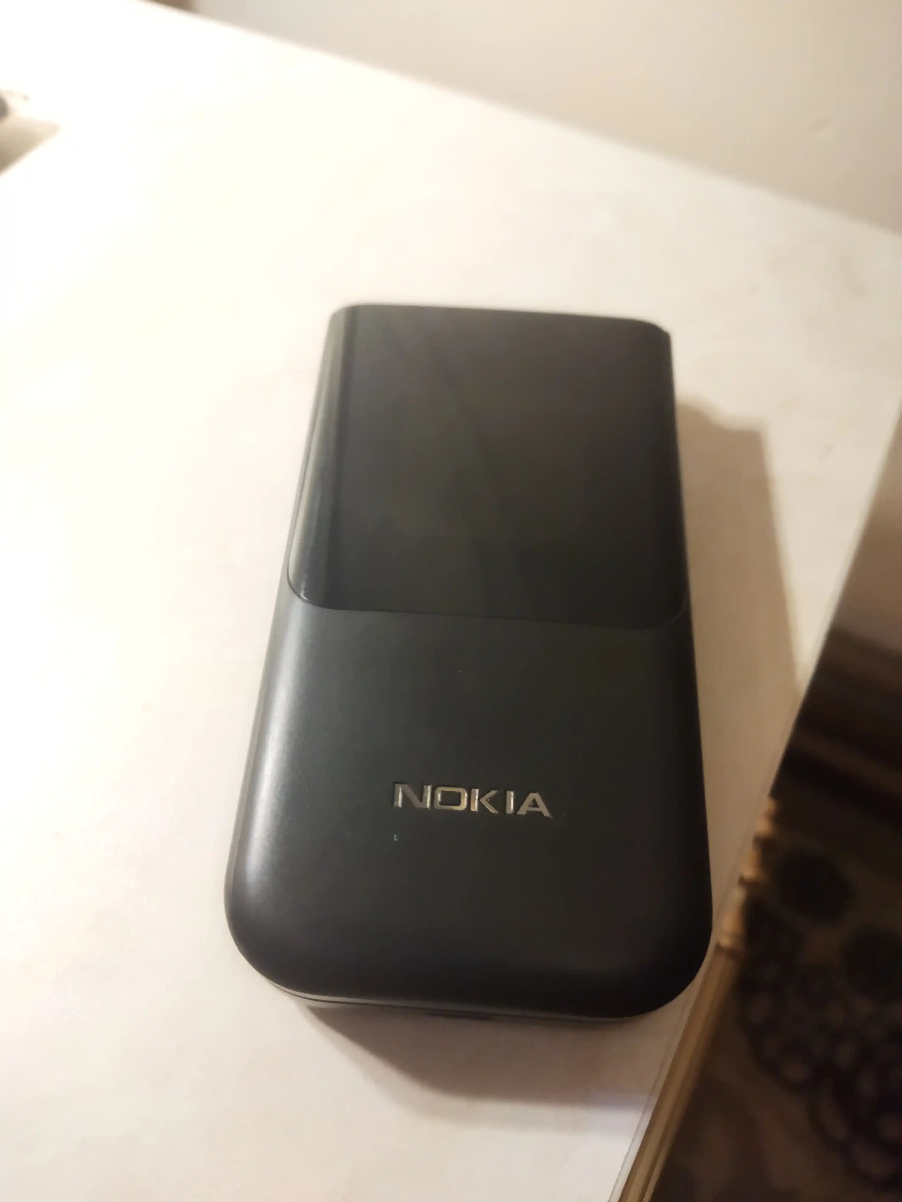 2660 tugmali telefon, Dual SIM, bukiluvchi, kuchli batareya va FM radioli