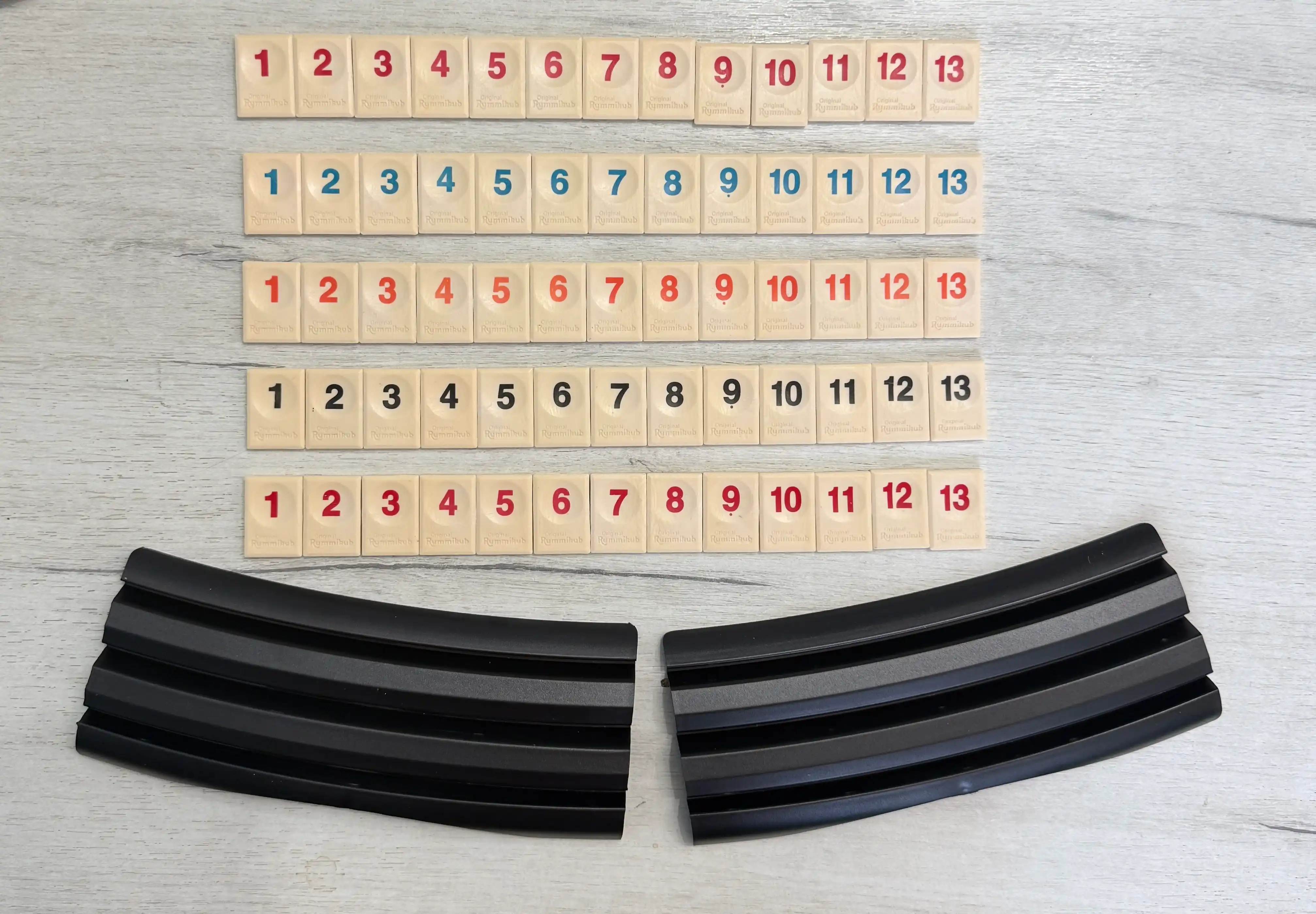Stol o'yini Rummikub Chegarasiz