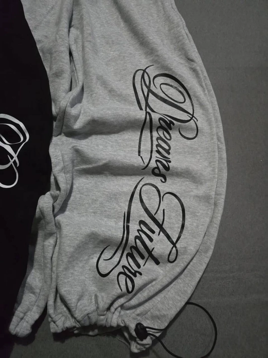 Ayollar joggerlari OVERSIZE paxta bosma bilan Dreams Hustle rezinkada 42–48