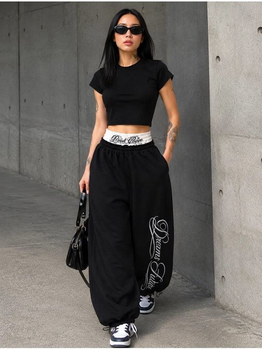 Ayollar joggerlari OVERSIZE paxta bosma bilan Dreams Hustle rezinkada 42–48