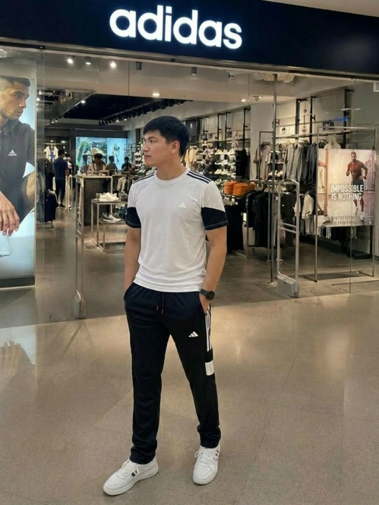 Erkaklar uchun yozgi sport kostyumi