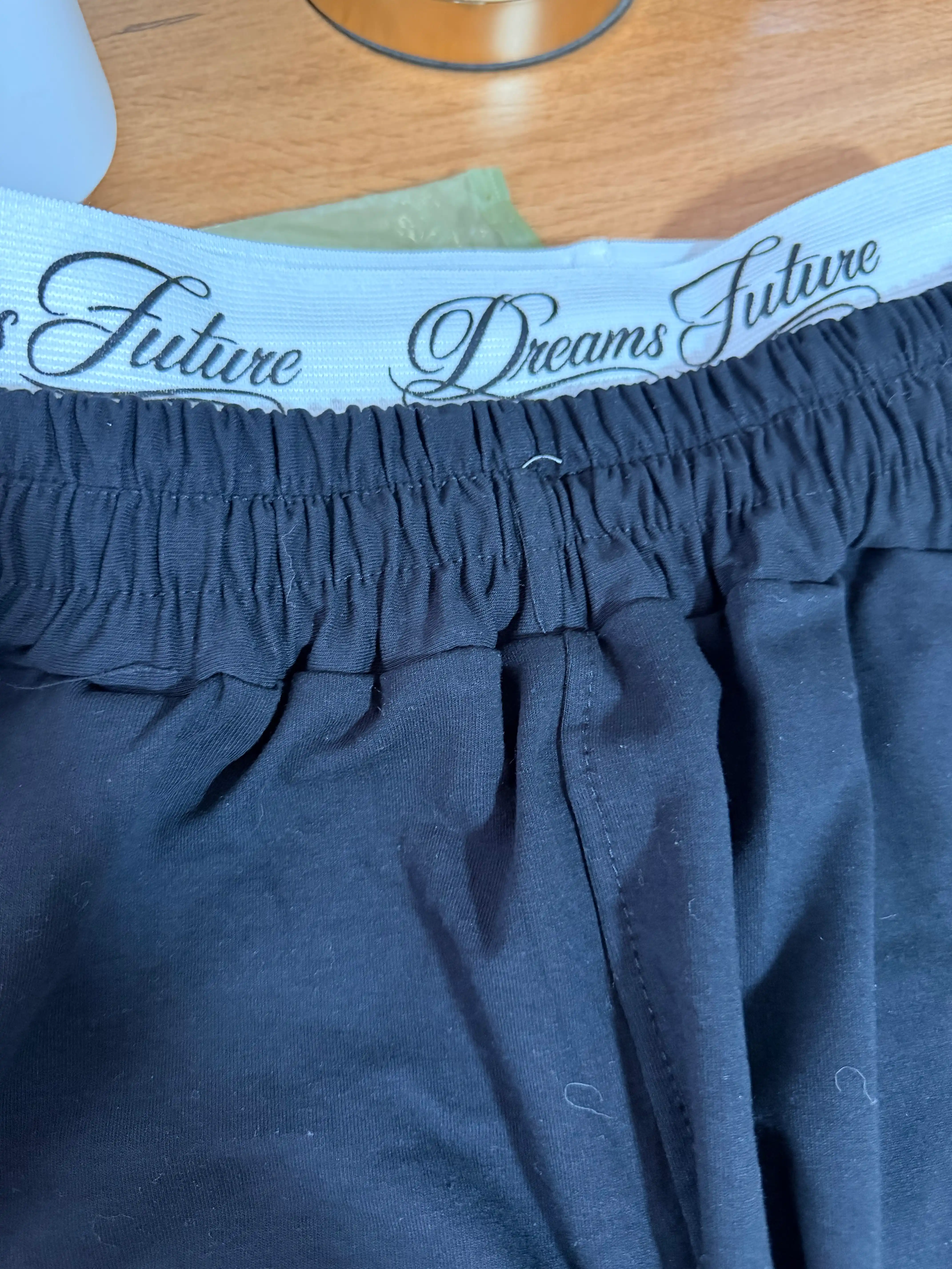 Ayollar joggerlari OVERSIZE paxta bosma bilan Dreams Hustle rezinkada 42–48