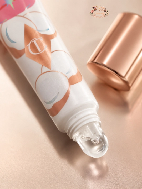 Масло для губ с кокосом и сияющий блеск Charlotte Tilbury Unreal Lips, 14 мл
