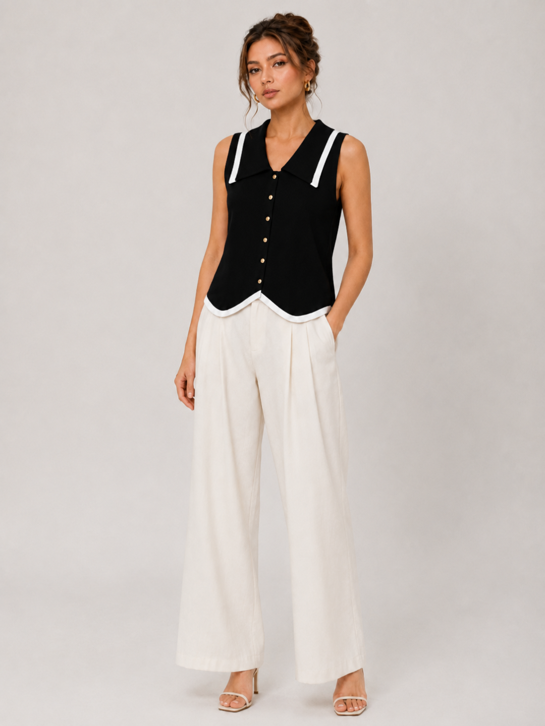 Ayollar uchun kuzgi trikotaj top-jilet, yengsiz, tugmali, kontrast yoqali