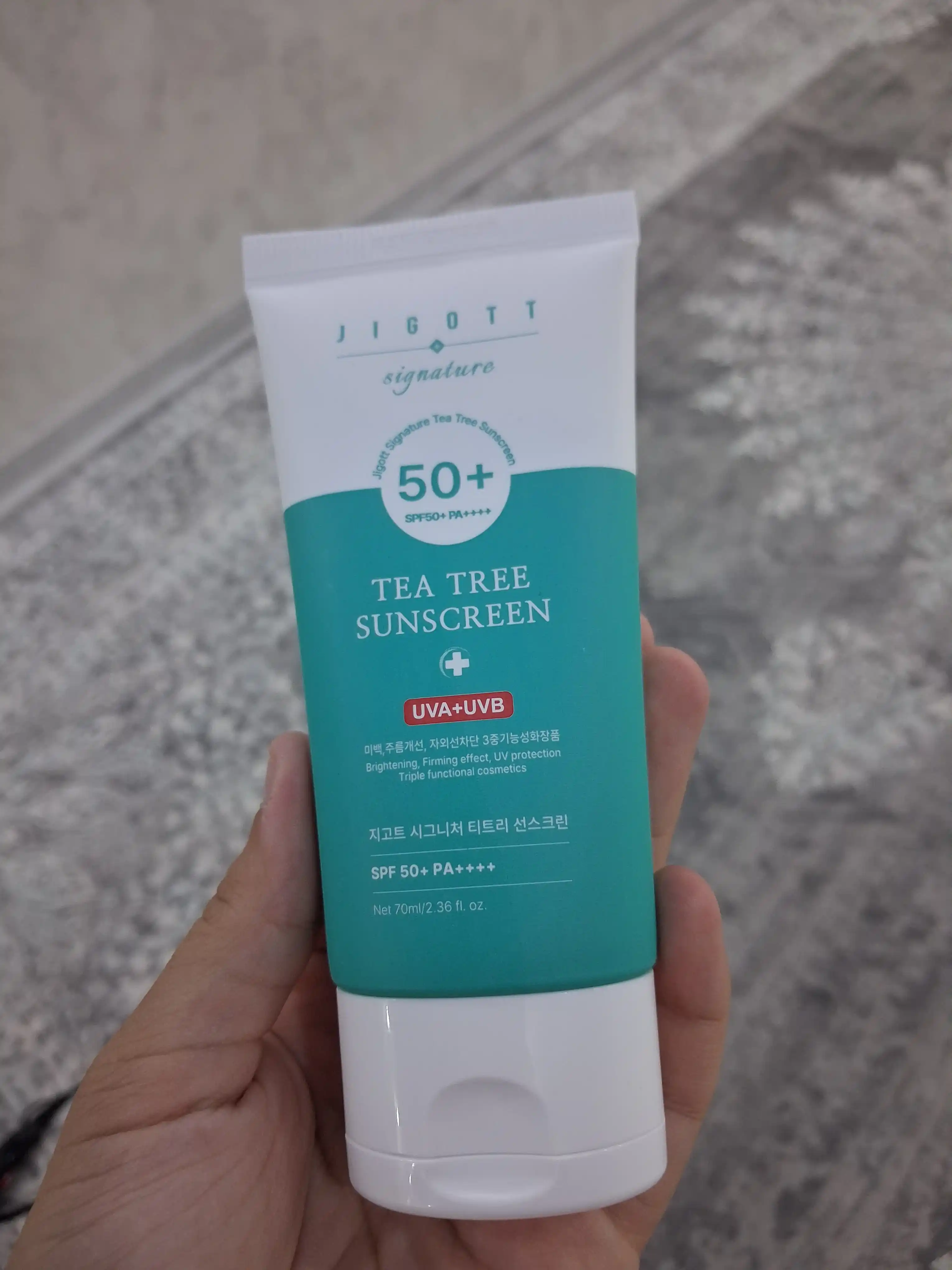 Quyoshdan himoya qiluvchi krem Jigott Collagen, Tea tree sunscreen SPF 50+ PA++++ 70 ml