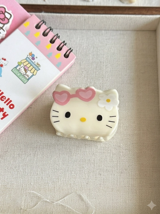 Hello Kitty bolalar soch to‘g‘nag‘ichi va qisqichbaqasi (Bir juft, kichik o'lchamda)