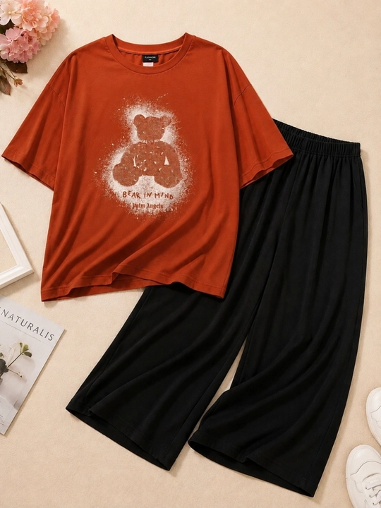 Женский костюм с футболкой oversize, и широкие брюки - 