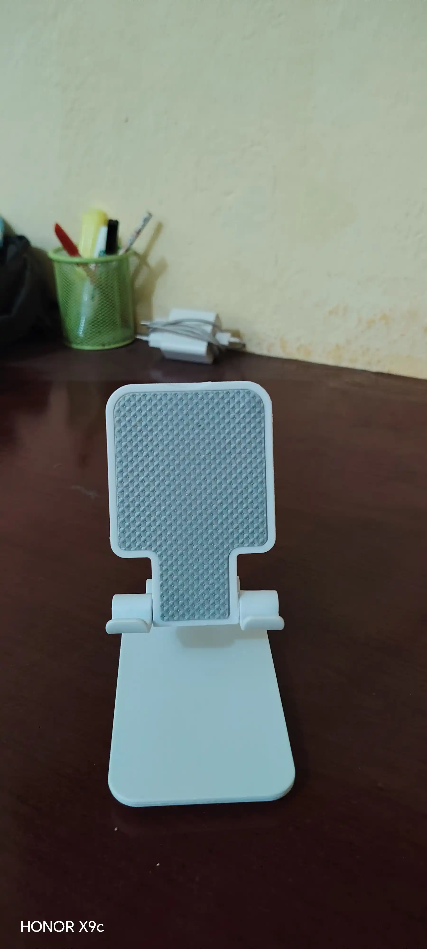 Telefon va planshet uchun sozlanadigan, buklanadigan taglik-ushlagich