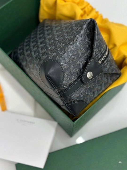 Мужской и женский клатч Goyard