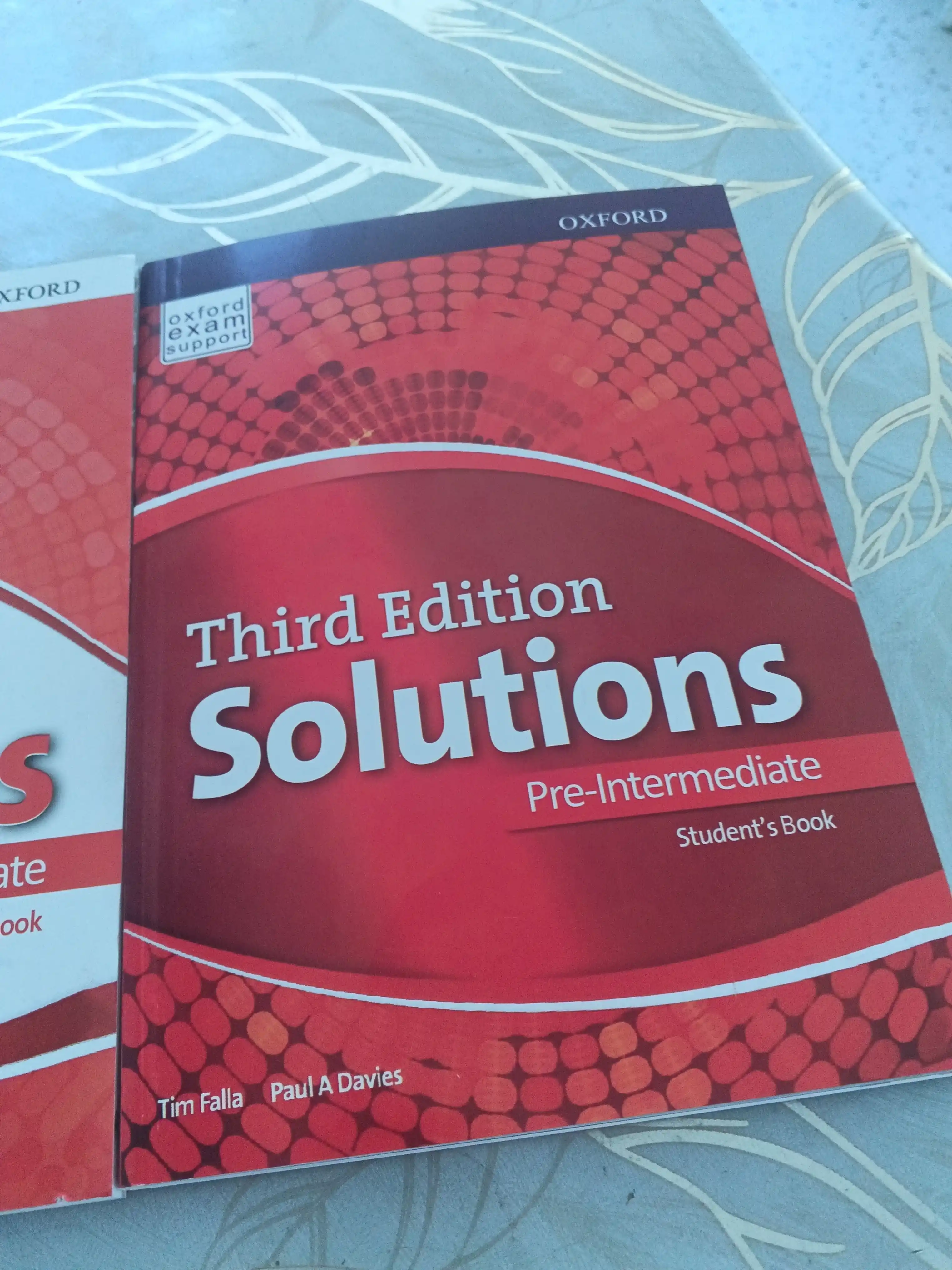 Solutions. Pre-Intermediate. Third Edition. Student's Book+Workbook
