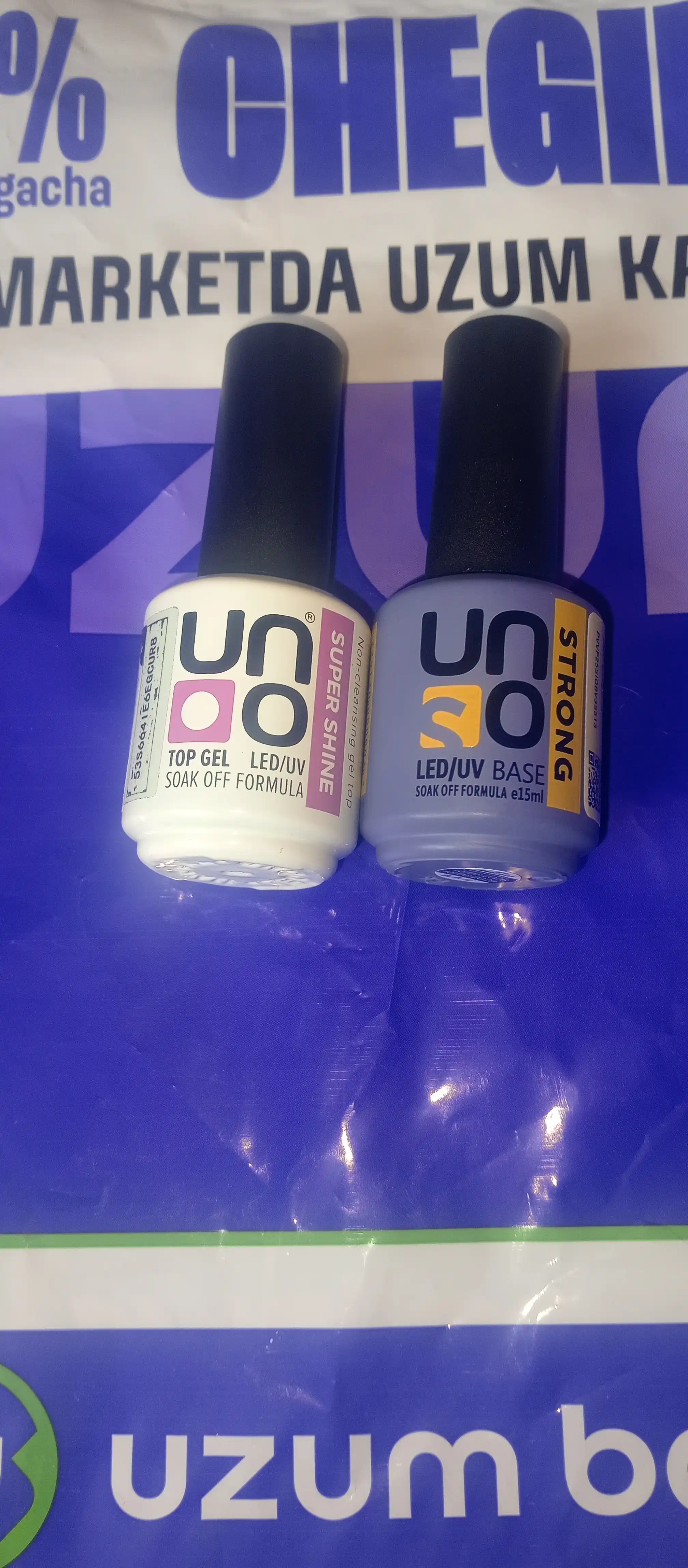 Baza, tirnoq bo'yog'i uchun asos qoplama Uno Strong, 15 ml