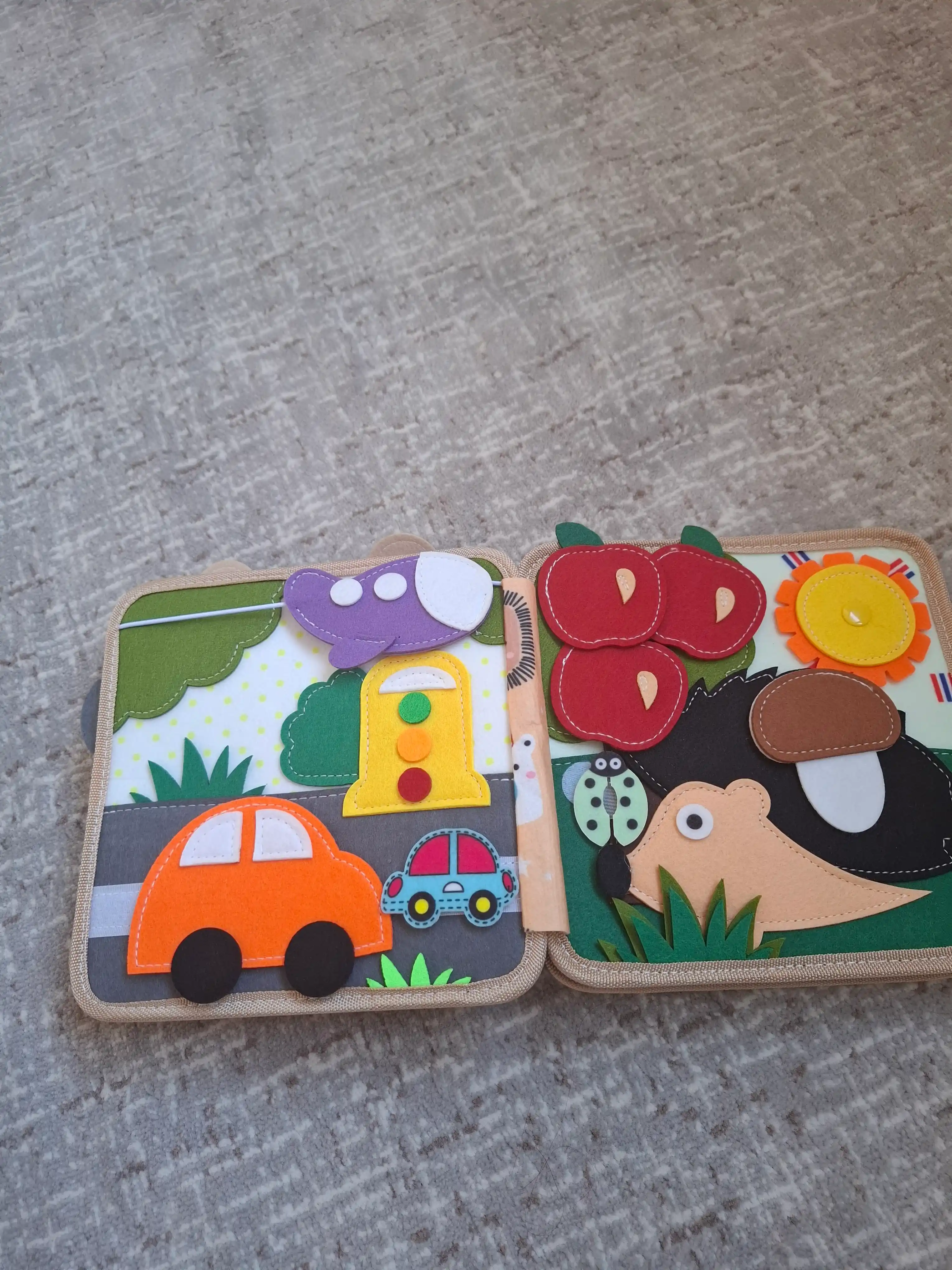 1 yoshgacha bo‘lgan bolalar uchun rivojlantiruvchi o‘yinchoq bizibord kitobchasi